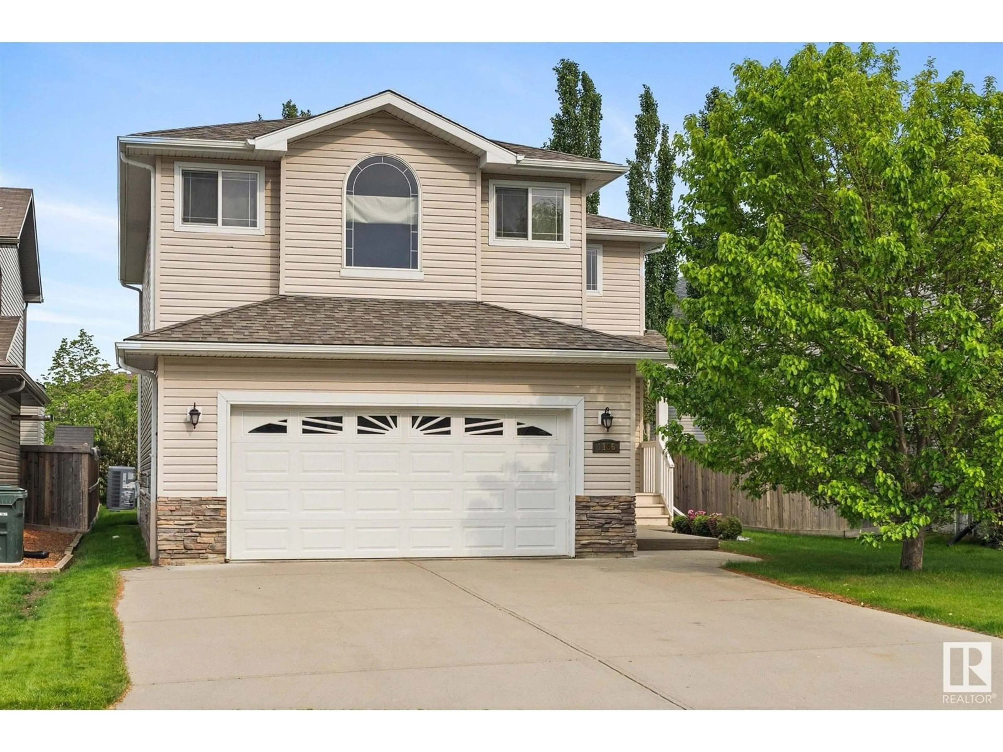 Home with vinyl exterior material, street for 1186 WESTERRA LI, Stony Plain Alberta T7Z2Z4