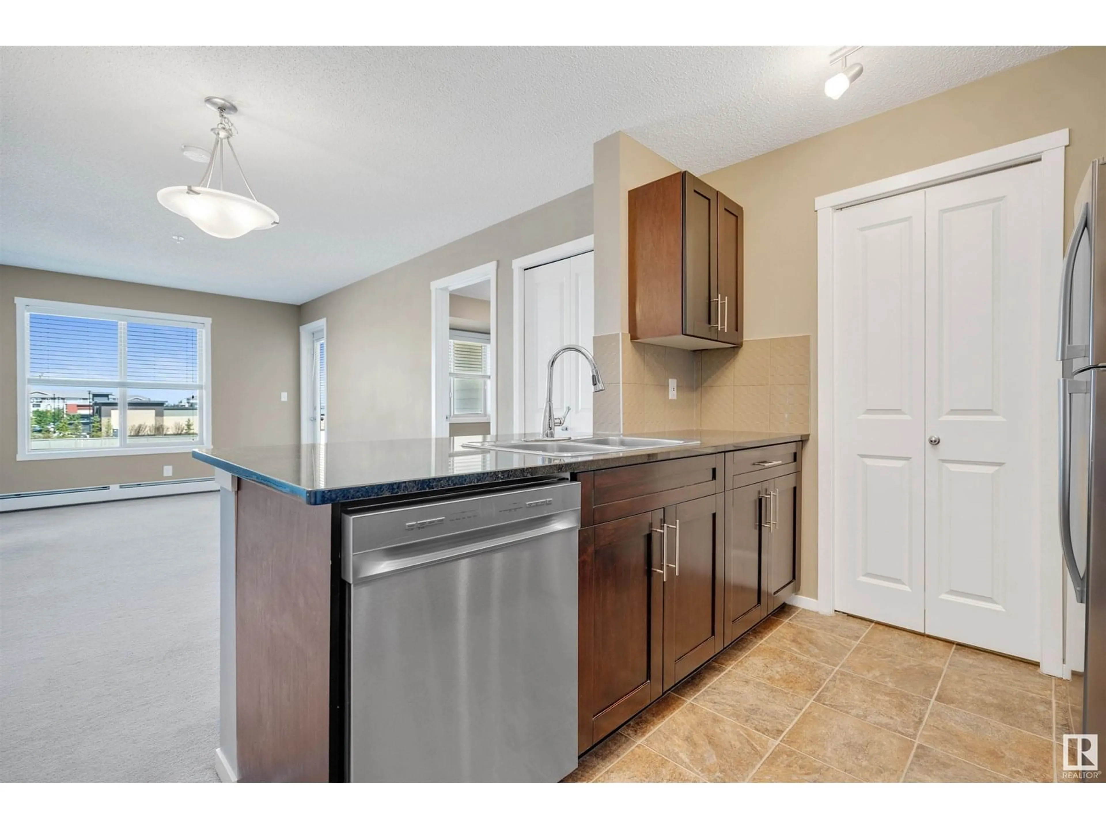 Standard kitchen, ceramic/tile floor for #307 - 5810 MULLEN PL, Edmonton Alberta T6R0W3