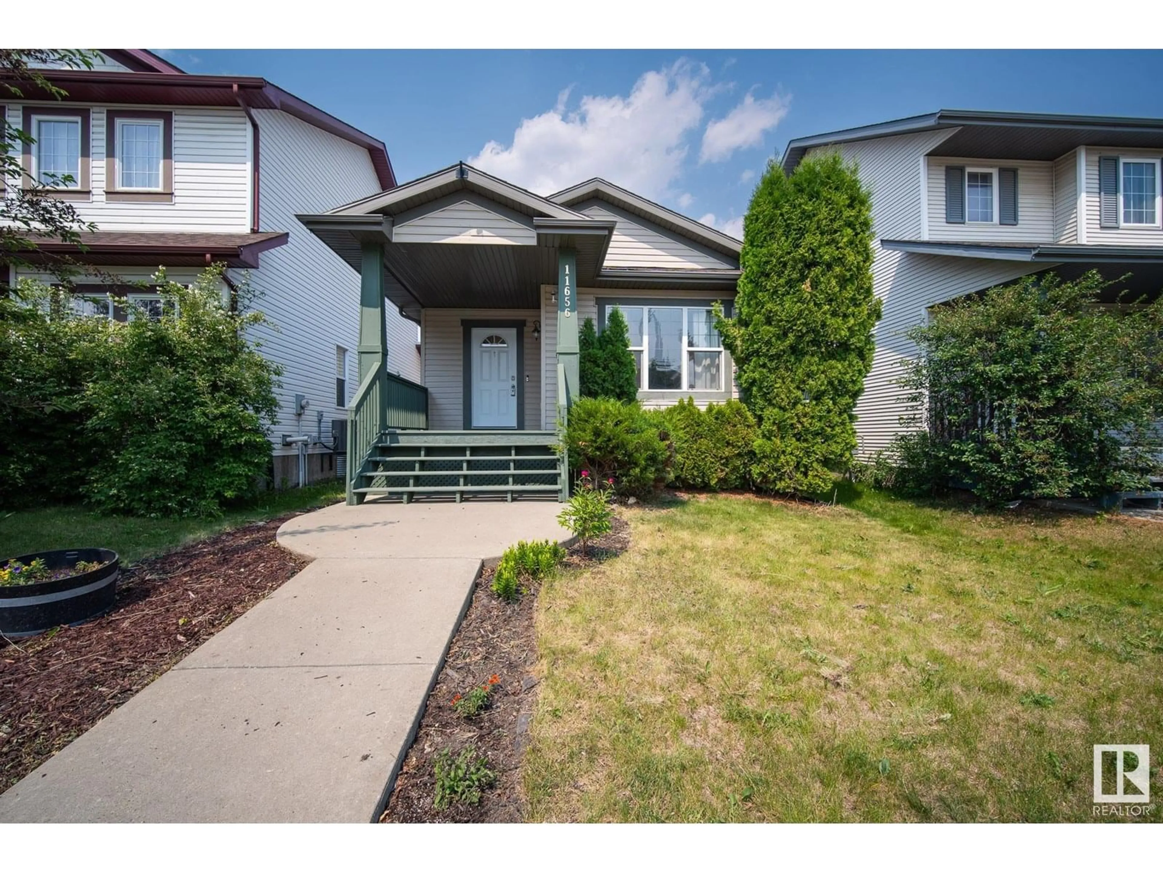 Home with vinyl exterior material, street for 11656 167A AV, Edmonton Alberta T5X6J5