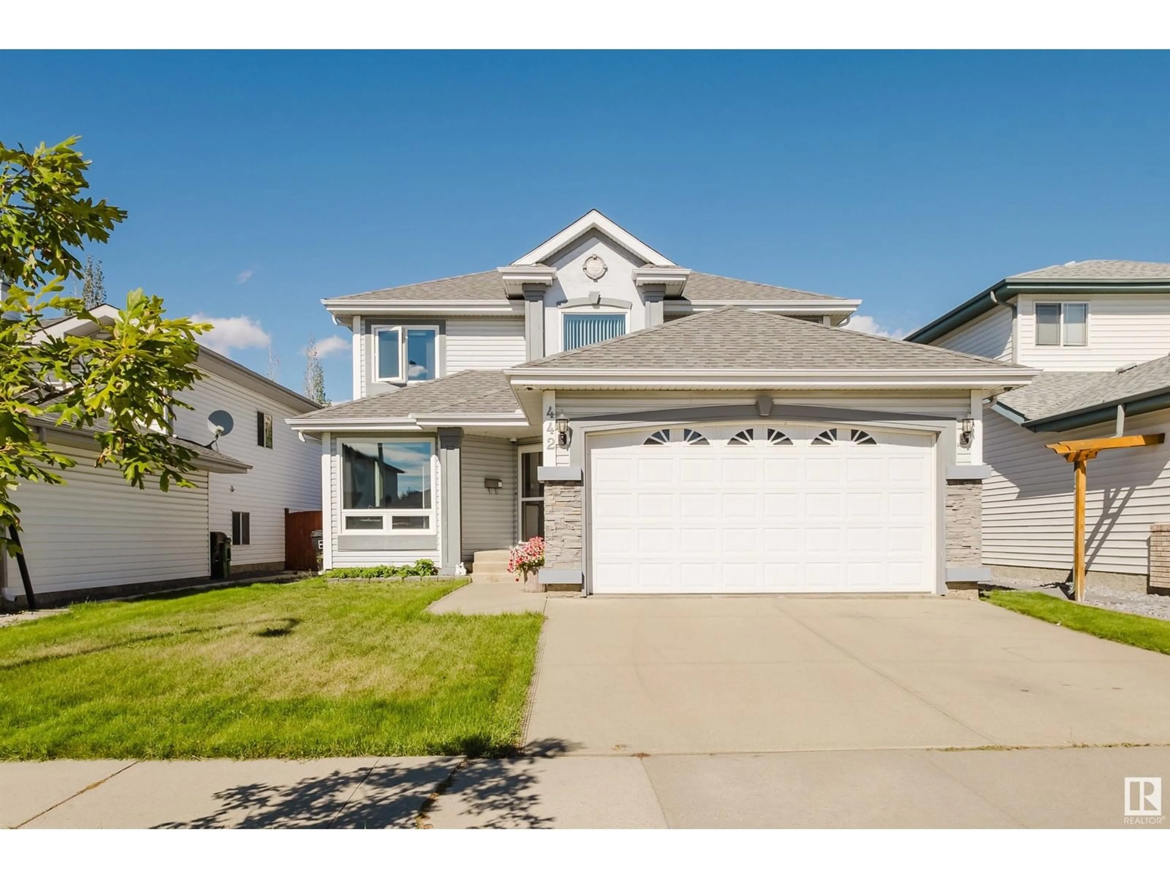 Home with vinyl exterior material, street for 442 KLARVATTEN LAKE WD, Edmonton Alberta T5Z3B9
