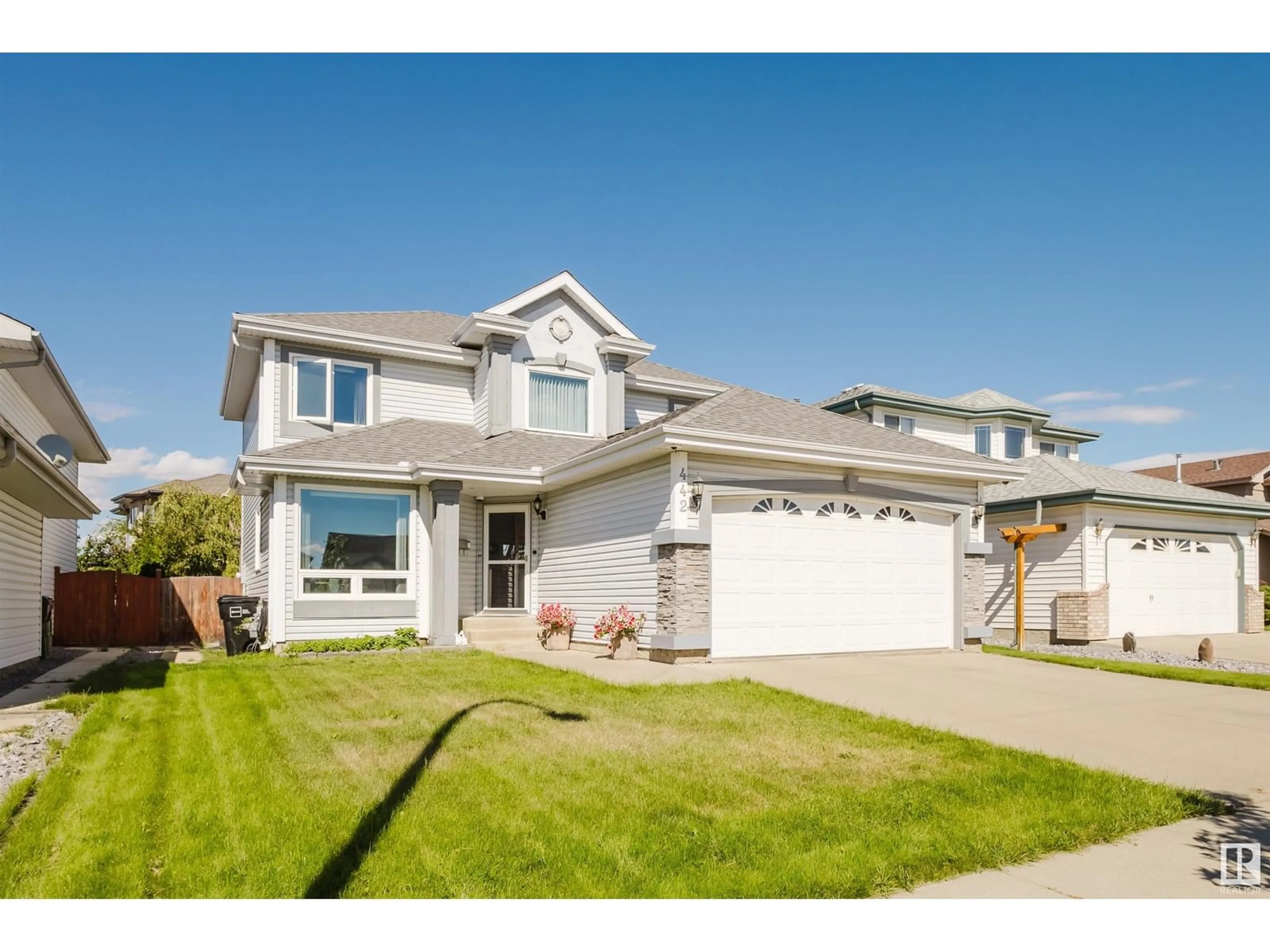 Home with vinyl exterior material, street for 442 KLARVATTEN LAKE WD, Edmonton Alberta T5Z3B9