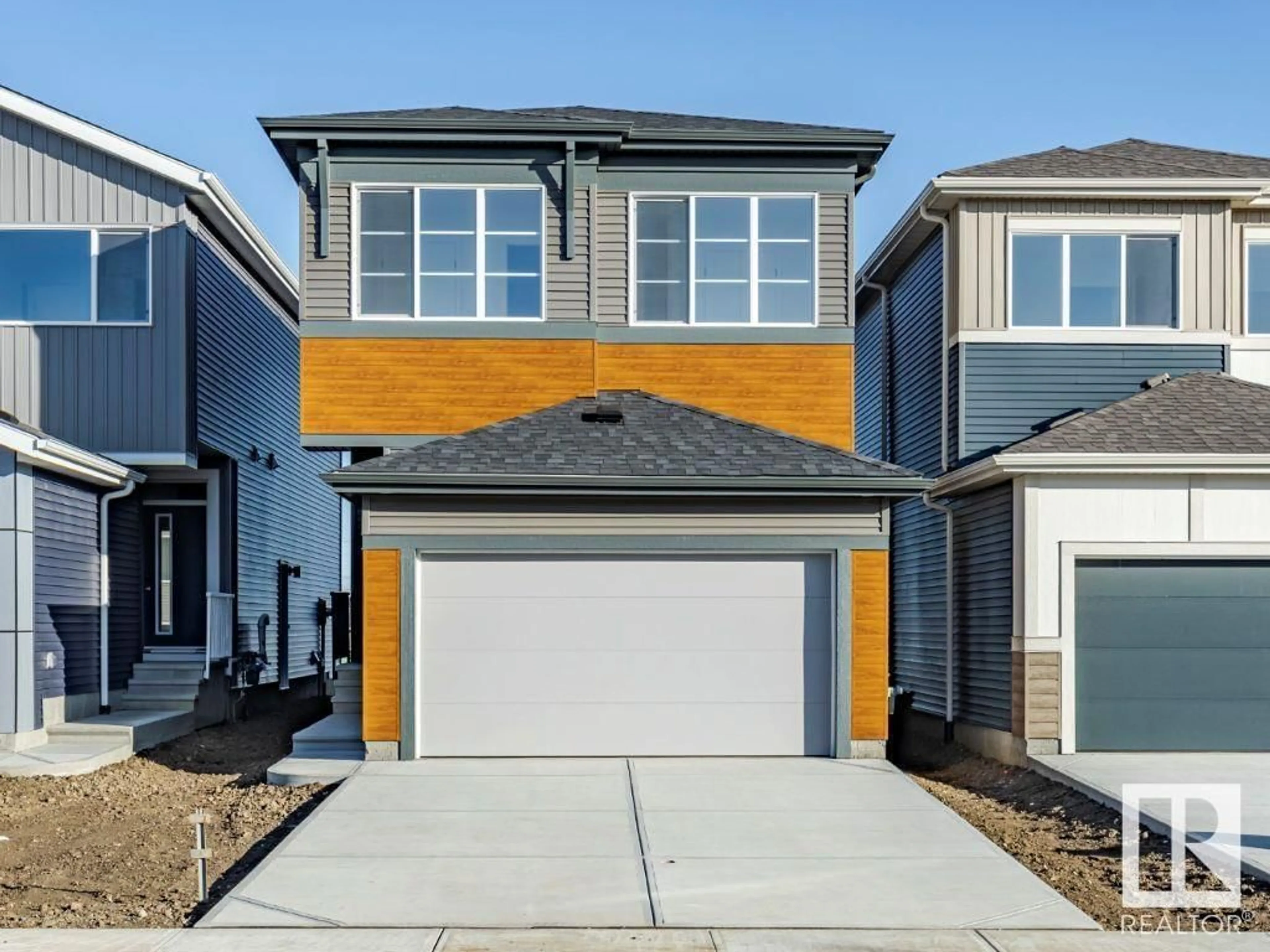 Home with vinyl exterior material, street for 22931 80 AVENUE AVENUE, Edmonton Alberta T5T7Y1