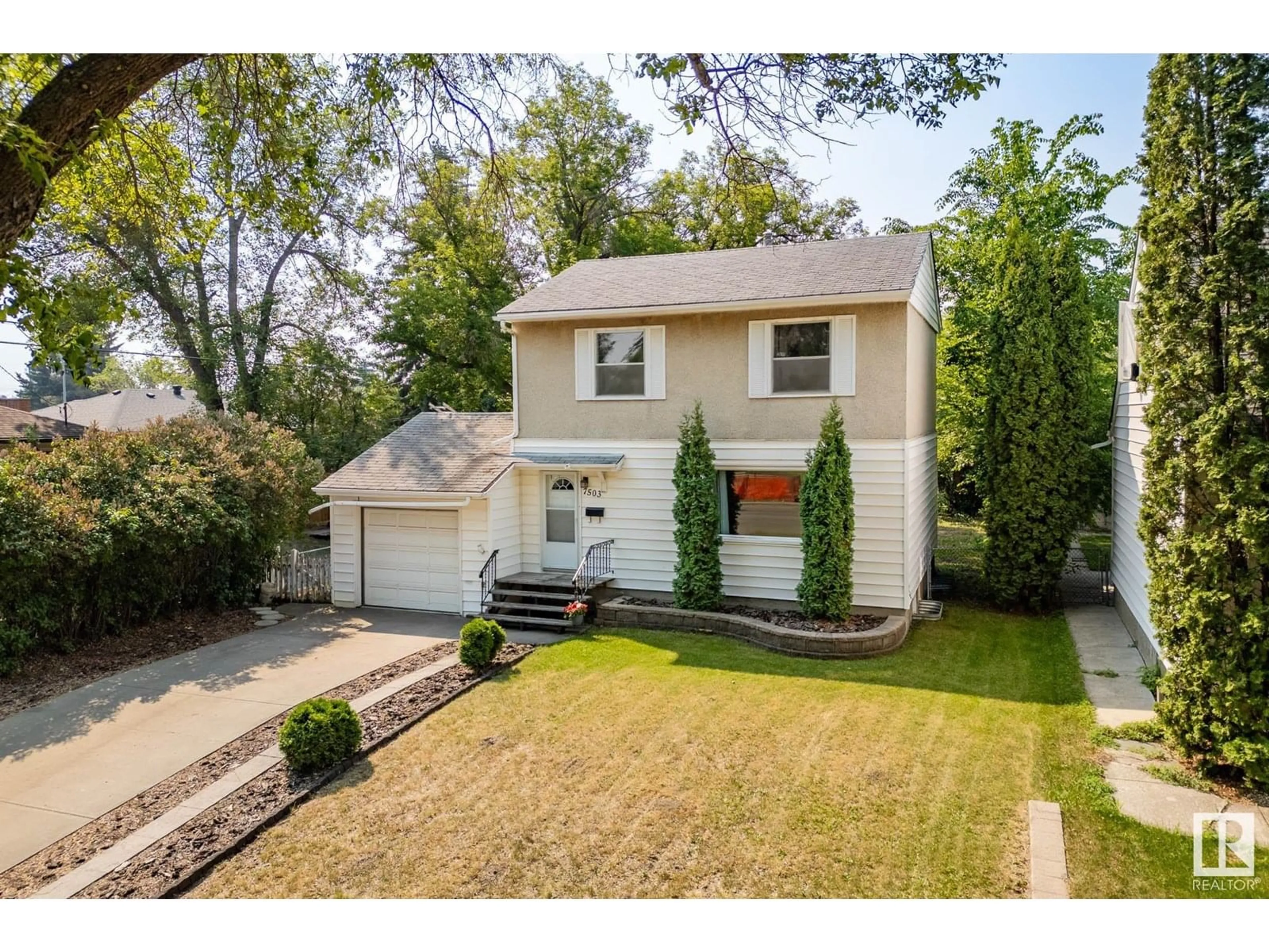 A pic from outside/outdoor area/front of a property/back of a property/a pic from drone, street for 7503 94 AV, Edmonton Alberta T6C1V9