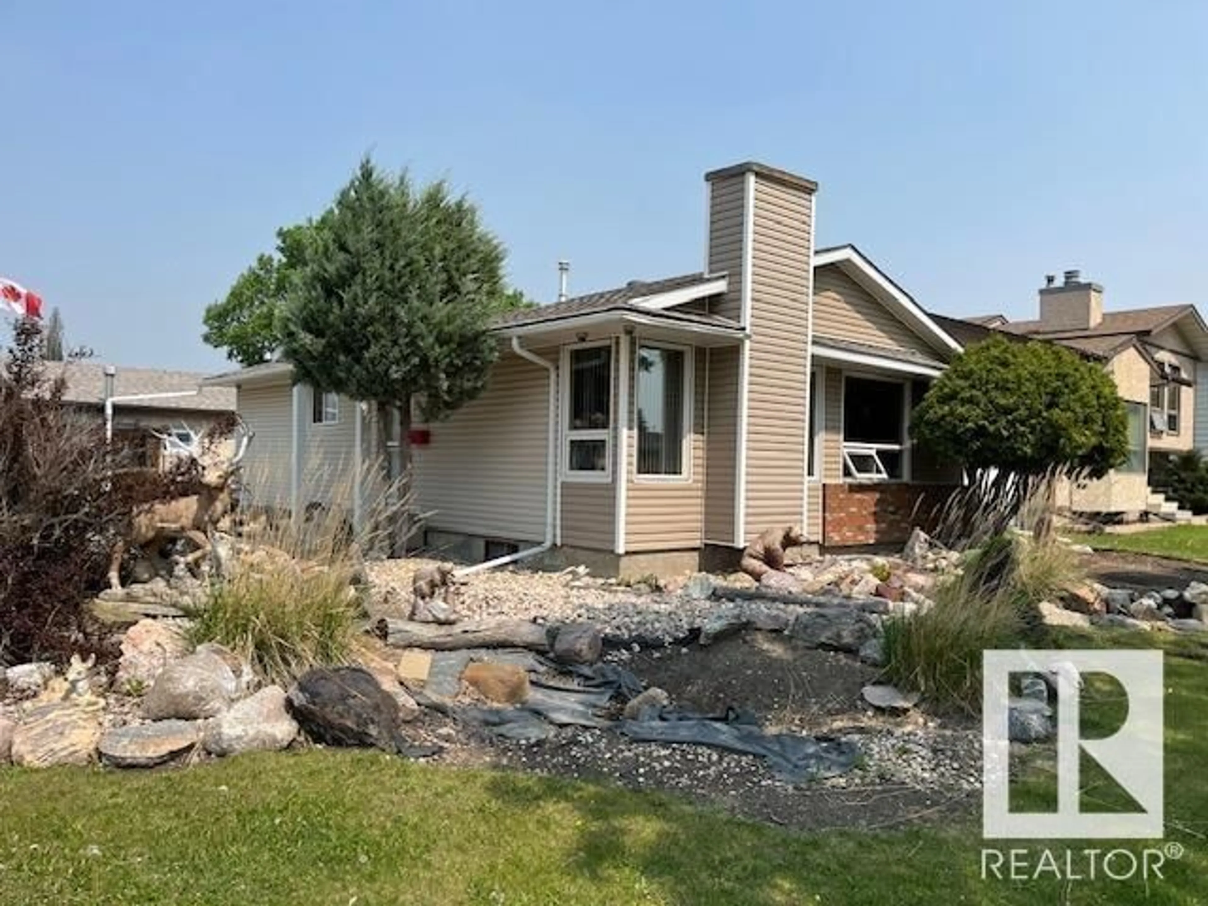 Home with vinyl exterior material, water/lake/river/ocean view for 17903 92A ST NW, Edmonton Alberta T5Z2J9