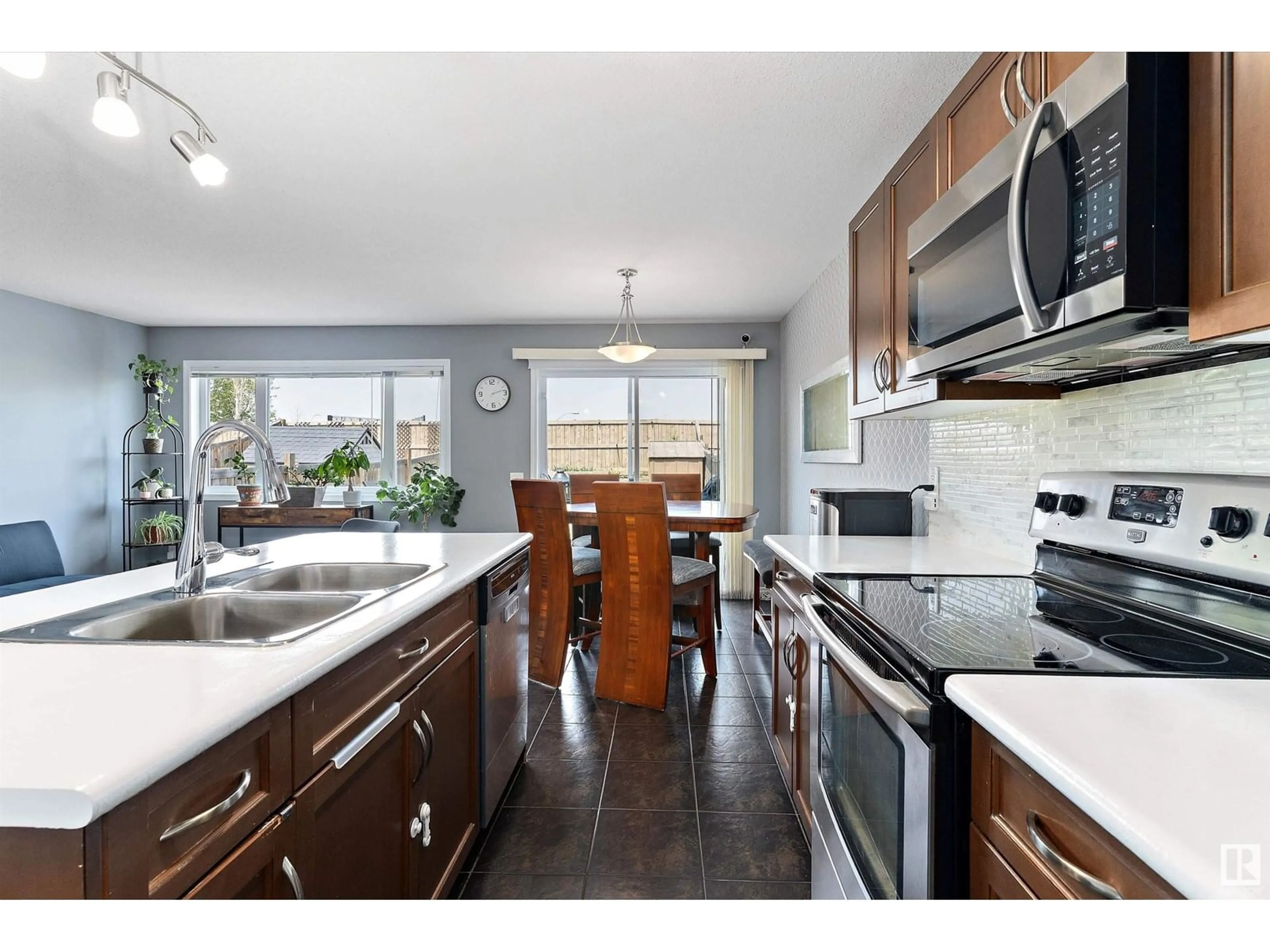 Open concept kitchen, ceramic/tile floor for 21924 99A AV, Edmonton Alberta T5T4T2