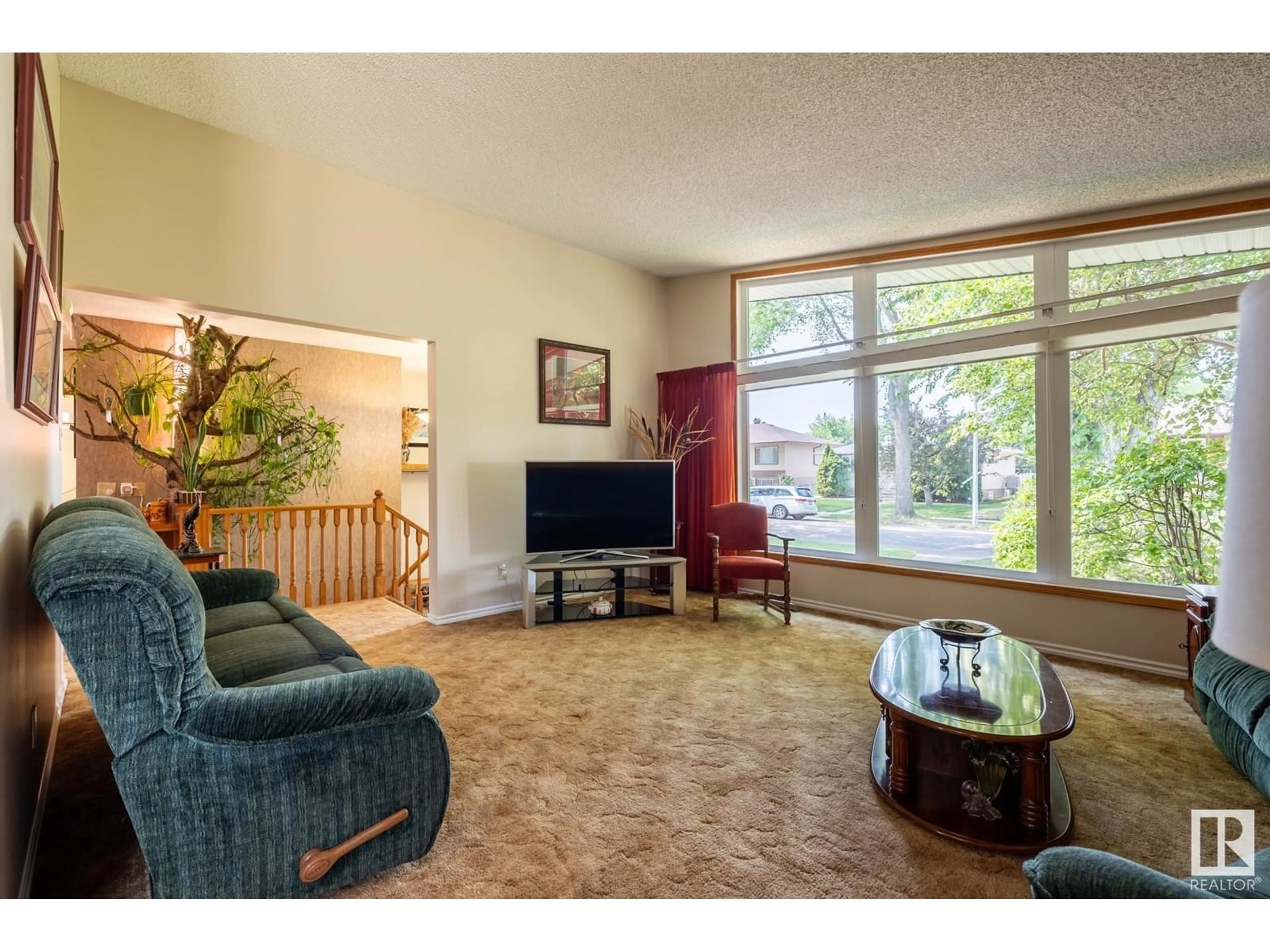 Living room with furniture, unknown for 10629 79 ST, Edmonton Alberta T6A3H5