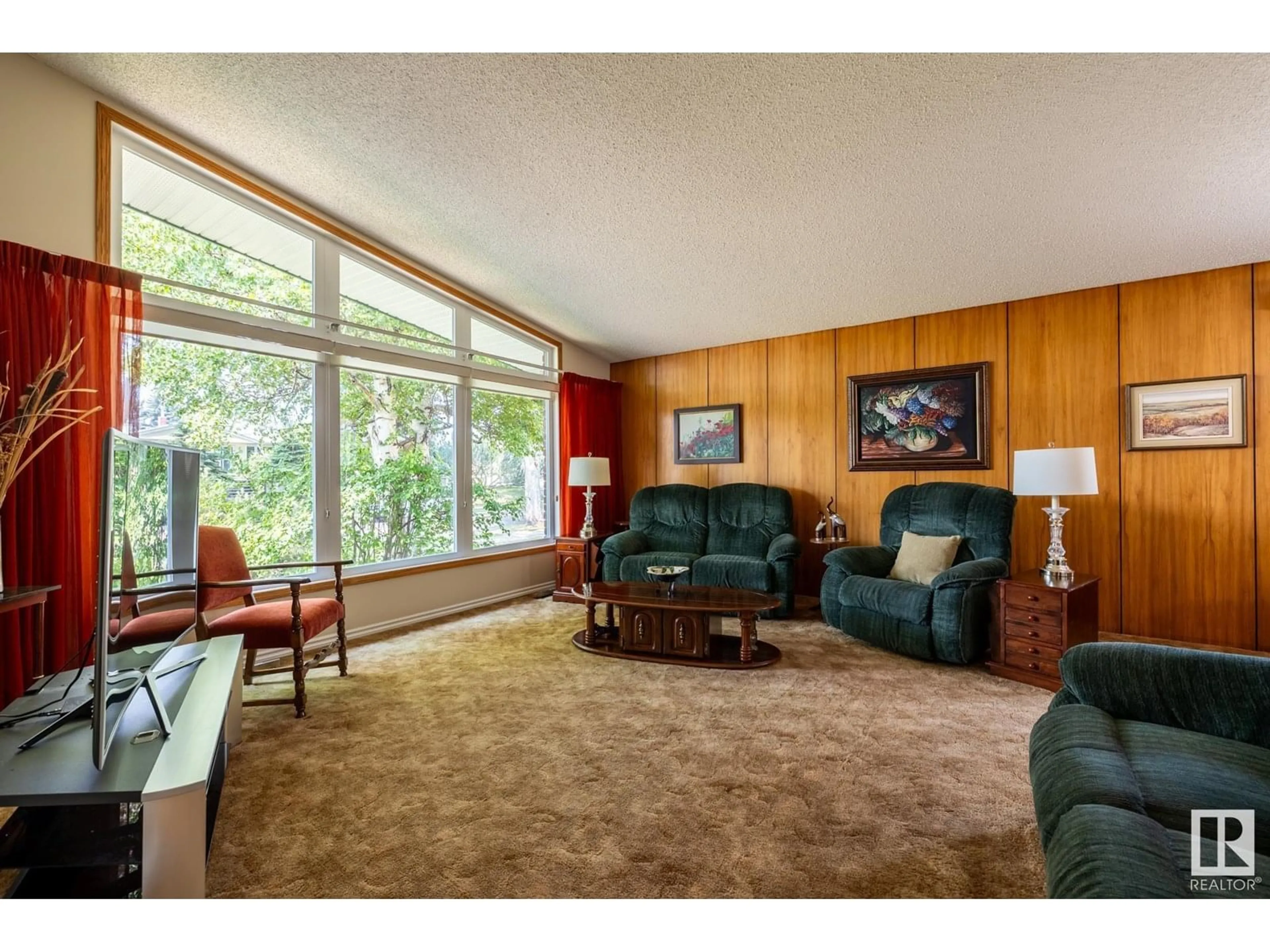 Living room with furniture, unknown for 10629 79 ST, Edmonton Alberta T6A3H5