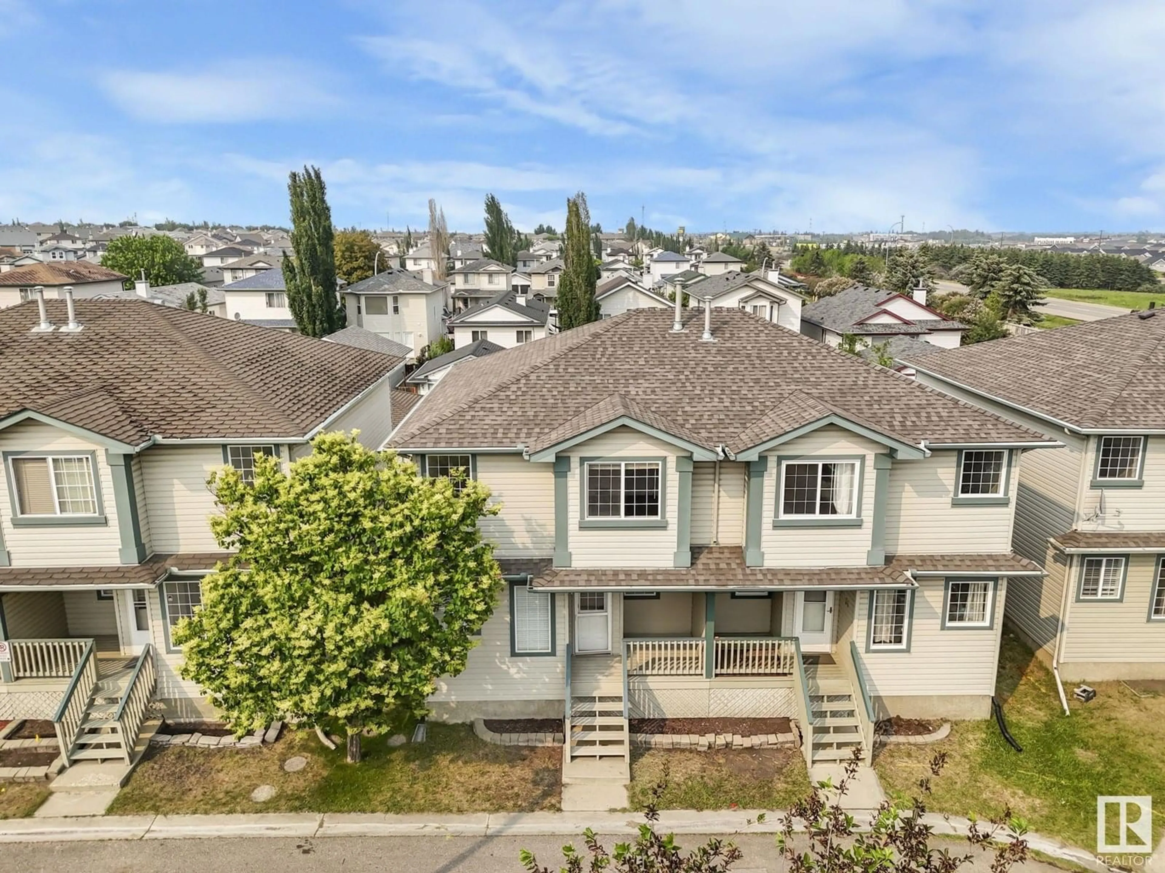 A pic from outside/outdoor area/front of a property/back of a property/a pic from drone, unknown for 32 - 14803 MILLER BV, Edmonton Alberta T5Y3A4