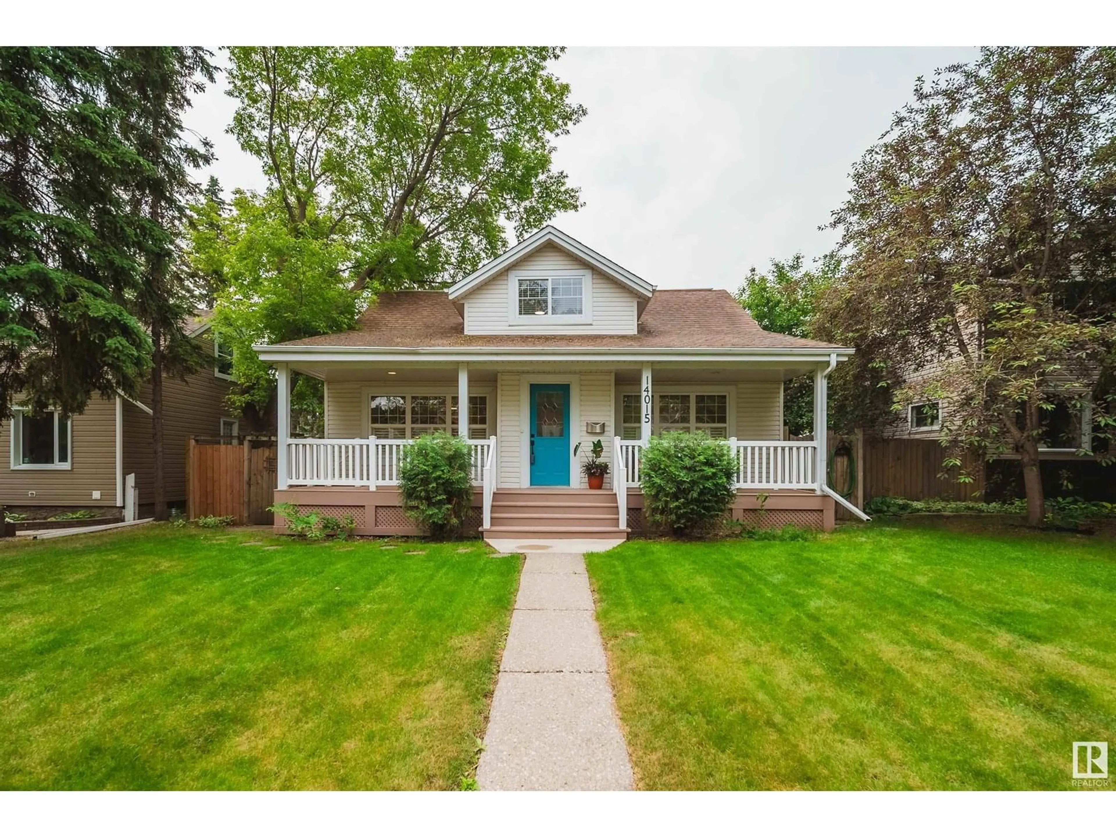 Home with vinyl exterior material, street for NW - 14015 104A AV, Edmonton Alberta T5N0Y1
