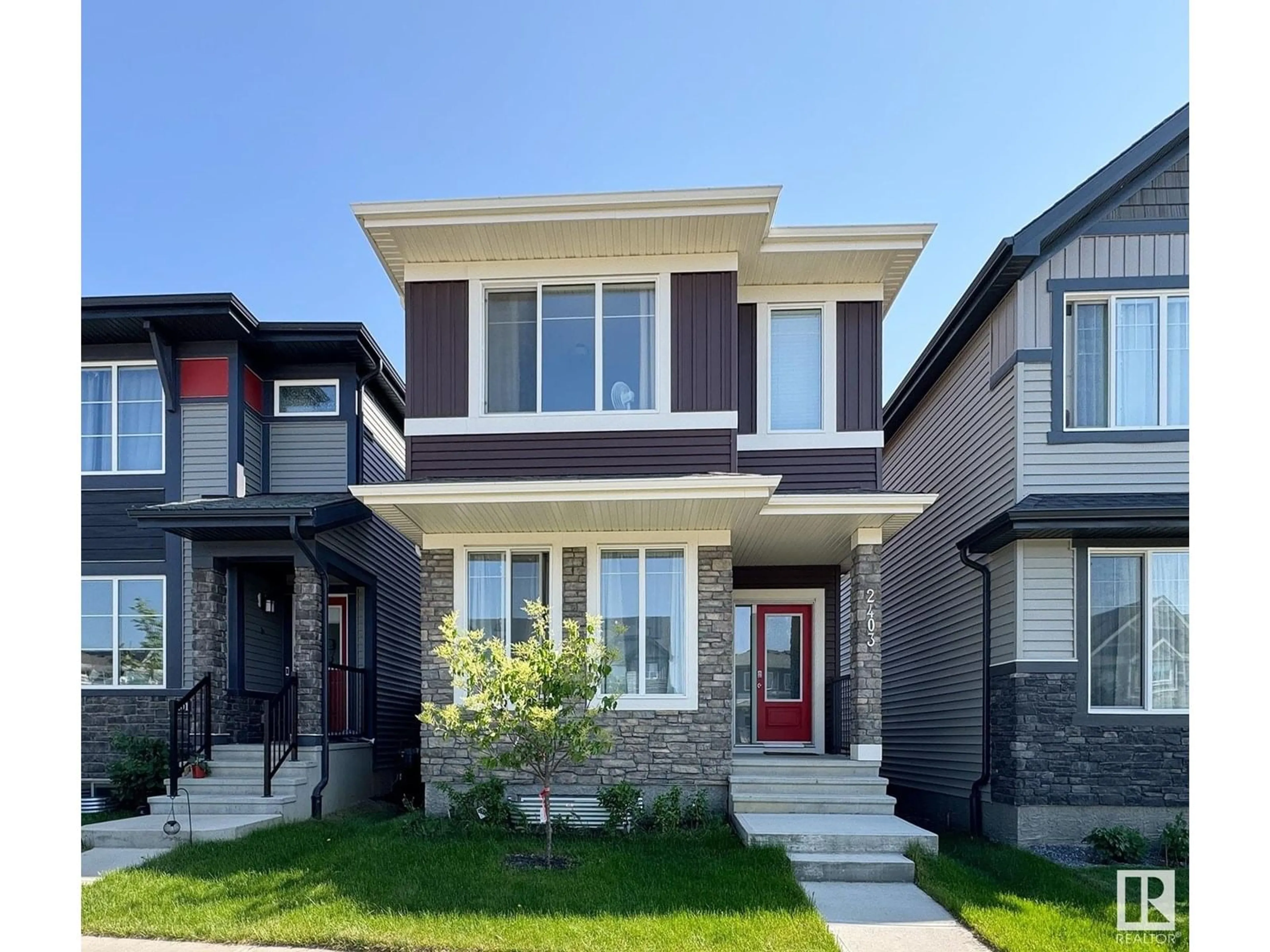 Home with brick exterior material, street for 2403 TRUMPETER WAY NW, Edmonton Alberta T5S0R8