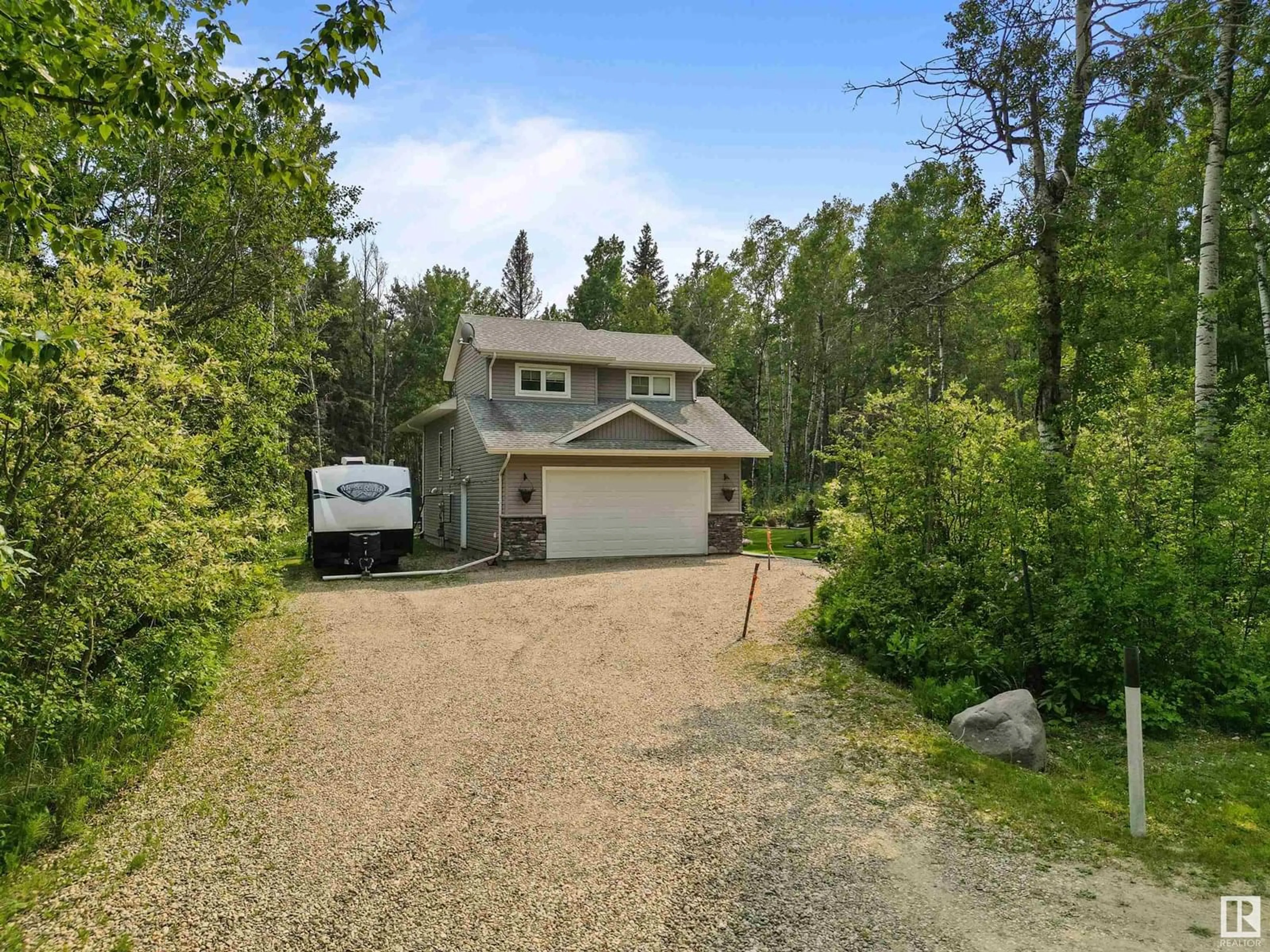 A pic from outside/outdoor area/front of a property/back of a property/a pic from drone, forest/trees view for 35 - 5429 TWP ROAD 494, Rural Brazeau County Alberta T0C1W0