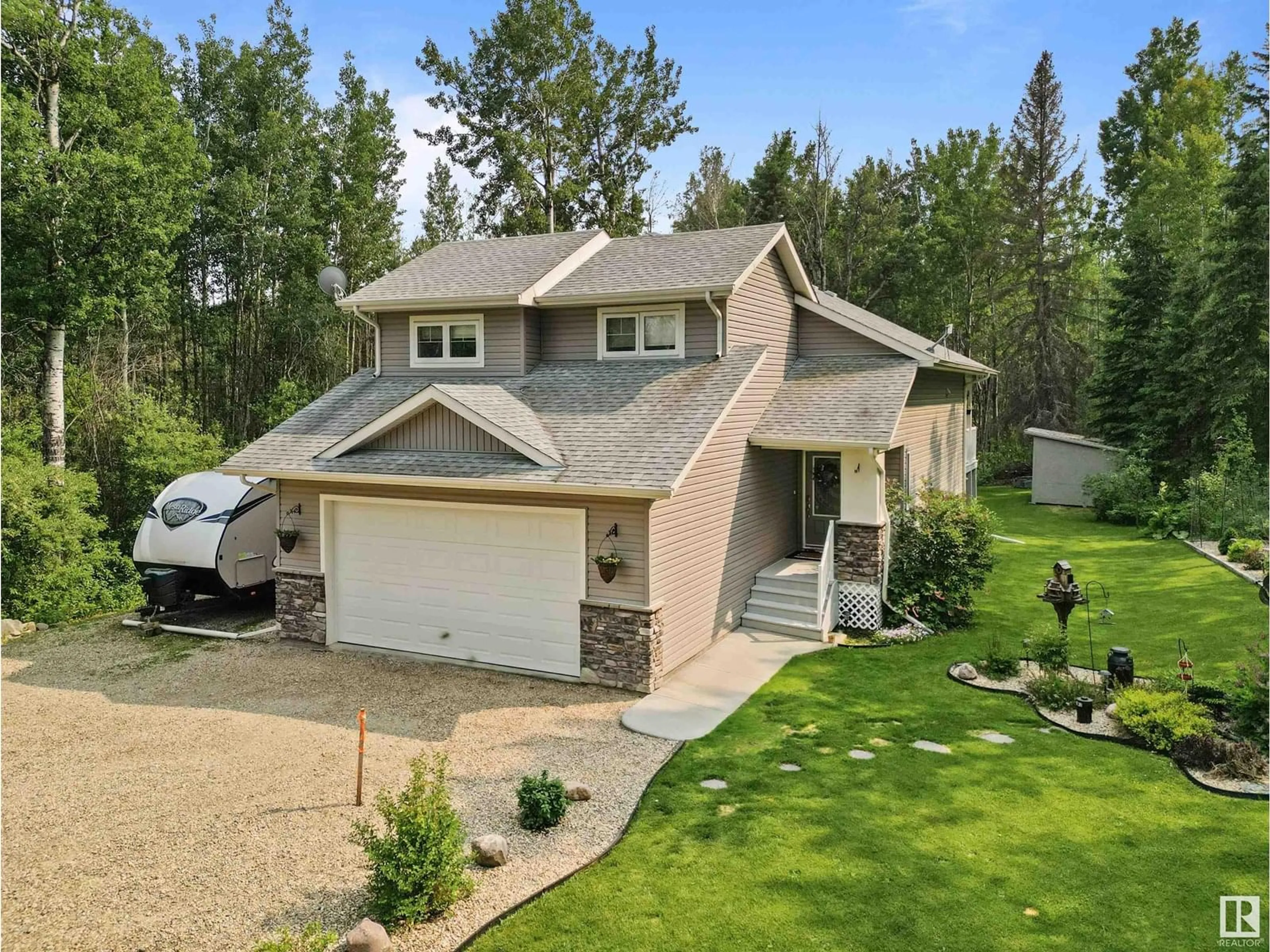 A pic from outside/outdoor area/front of a property/back of a property/a pic from drone, street for 35 - 5429 TWP ROAD 494, Rural Brazeau County Alberta T0C1W0