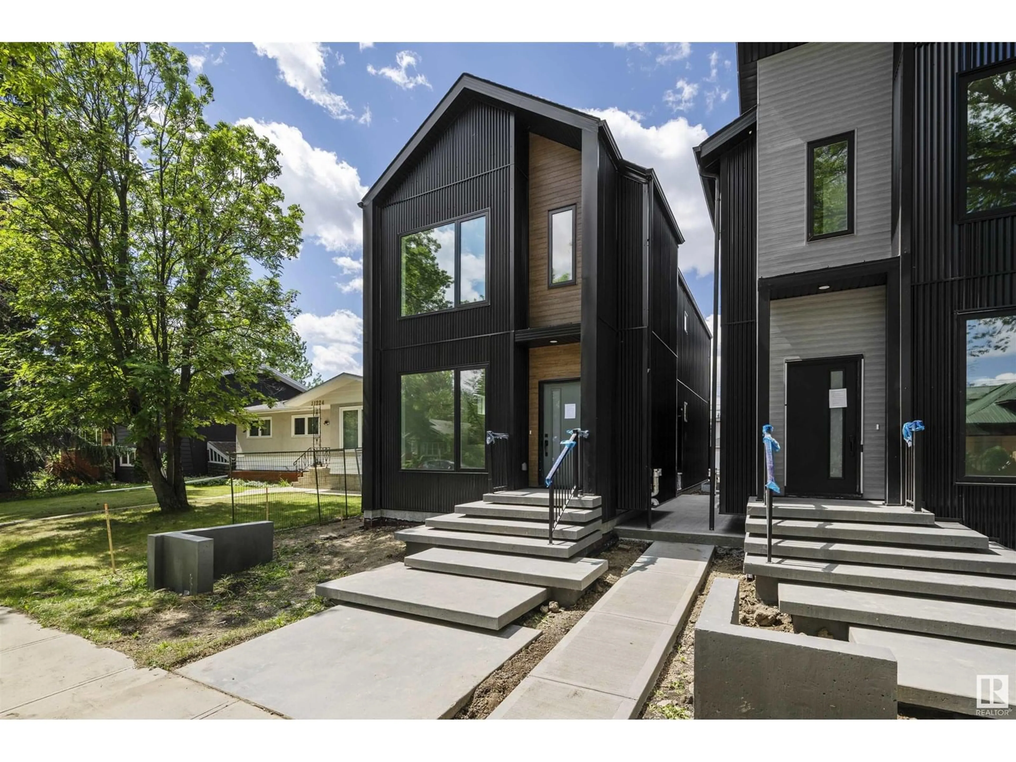 Home with brick exterior material, street for 11230 127 ST, Edmonton Alberta T5M0T6