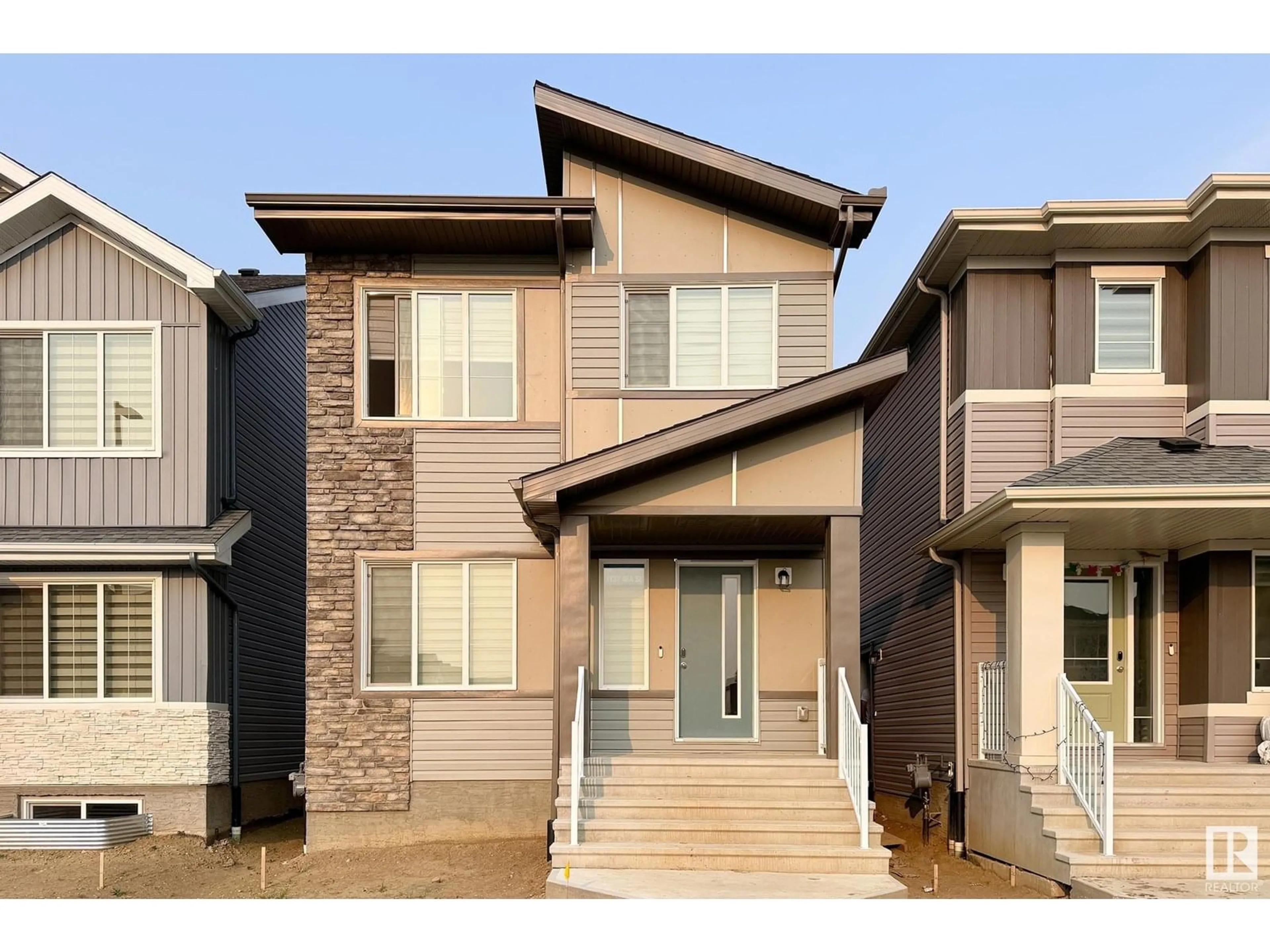 Home with vinyl exterior material, street for 7137 46A ST, Beaumont Alberta T4X3B1