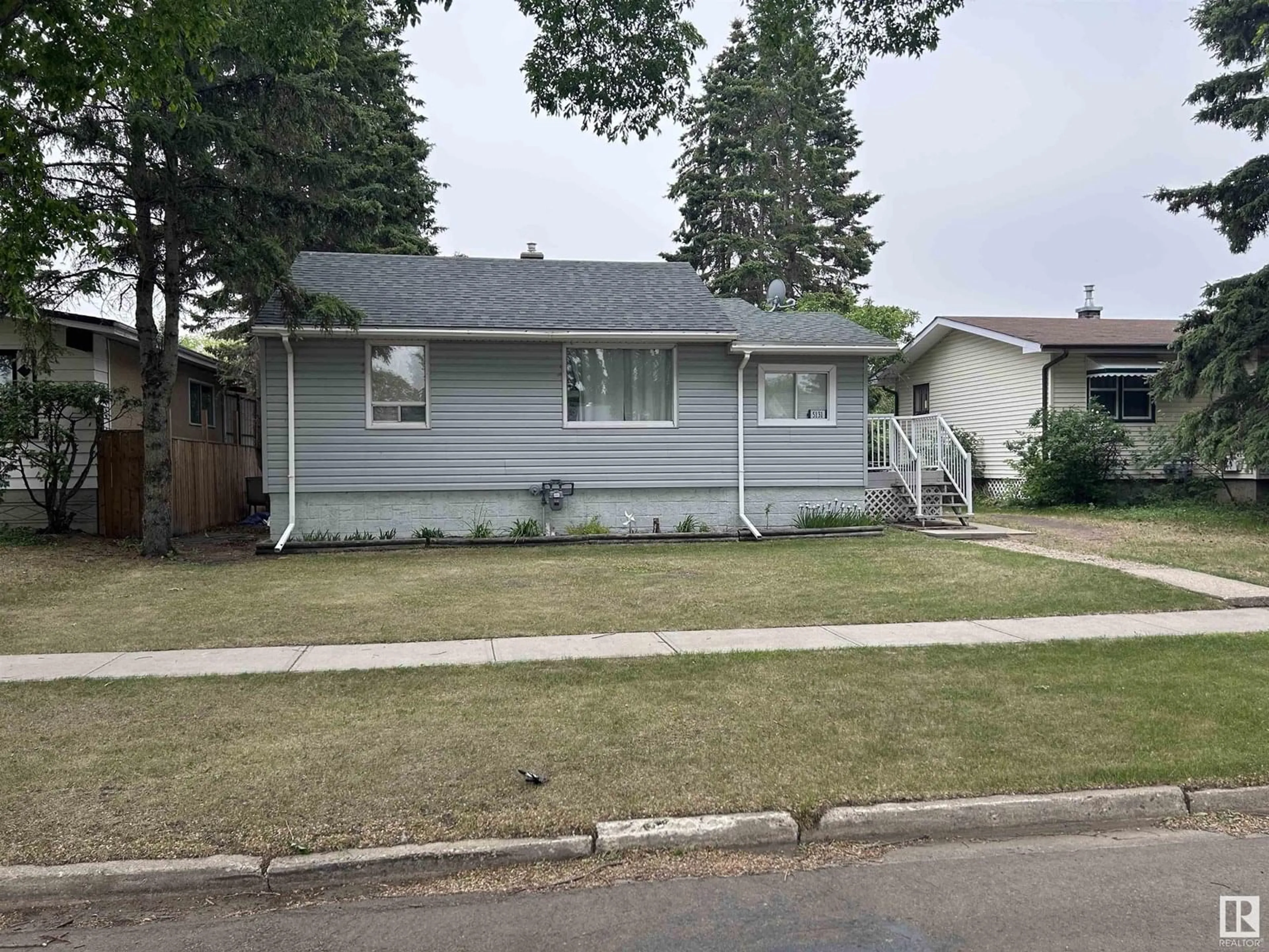 Home with vinyl exterior material, street for 5131 52 ST, Redwater Alberta T0A2W0