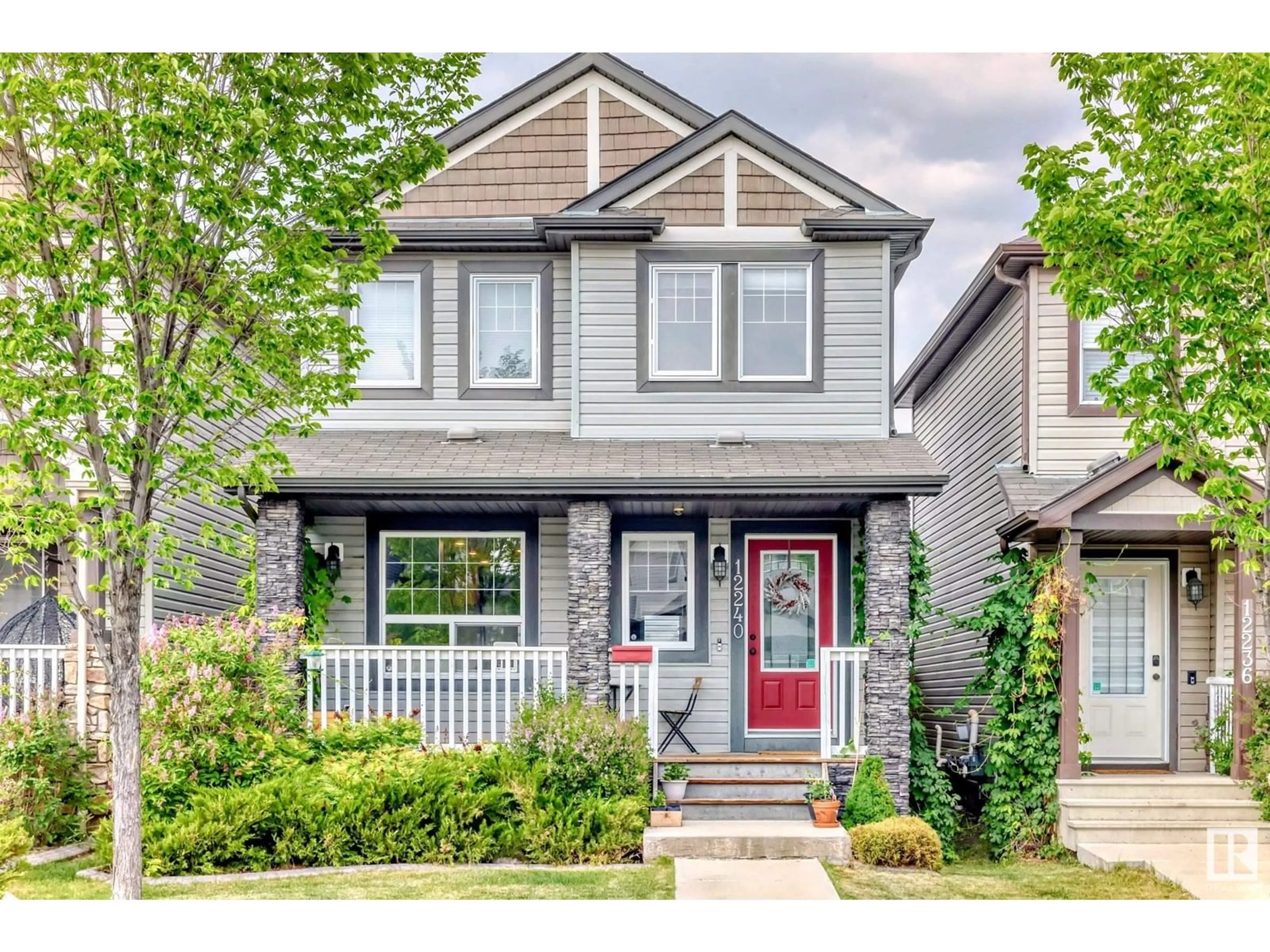 Home with vinyl exterior material, street for 12240 173 AV, Edmonton Alberta T5X0K2