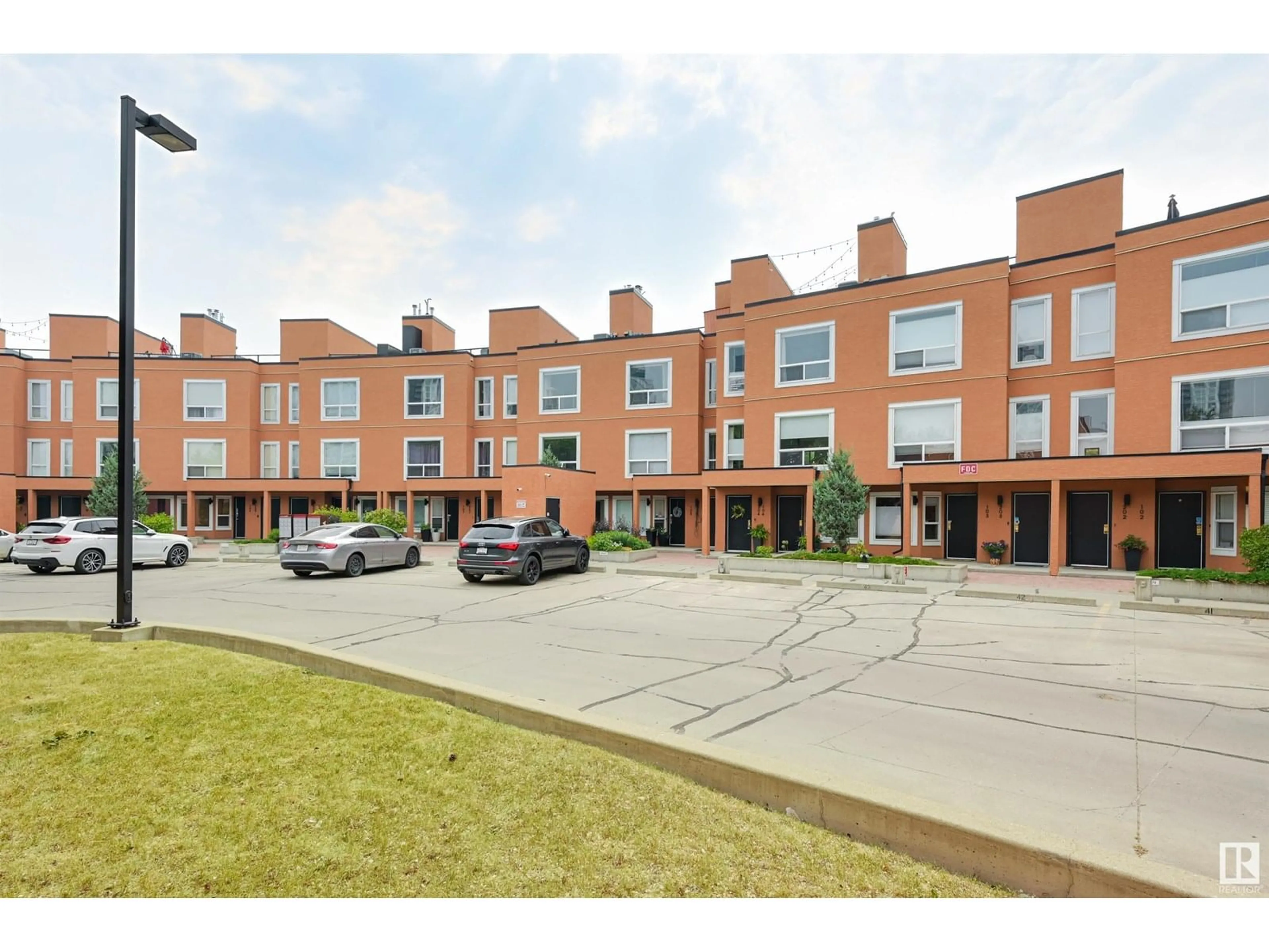Home with brick exterior material, street for #104 - 10105 95 ST, Edmonton Alberta T5H4M4