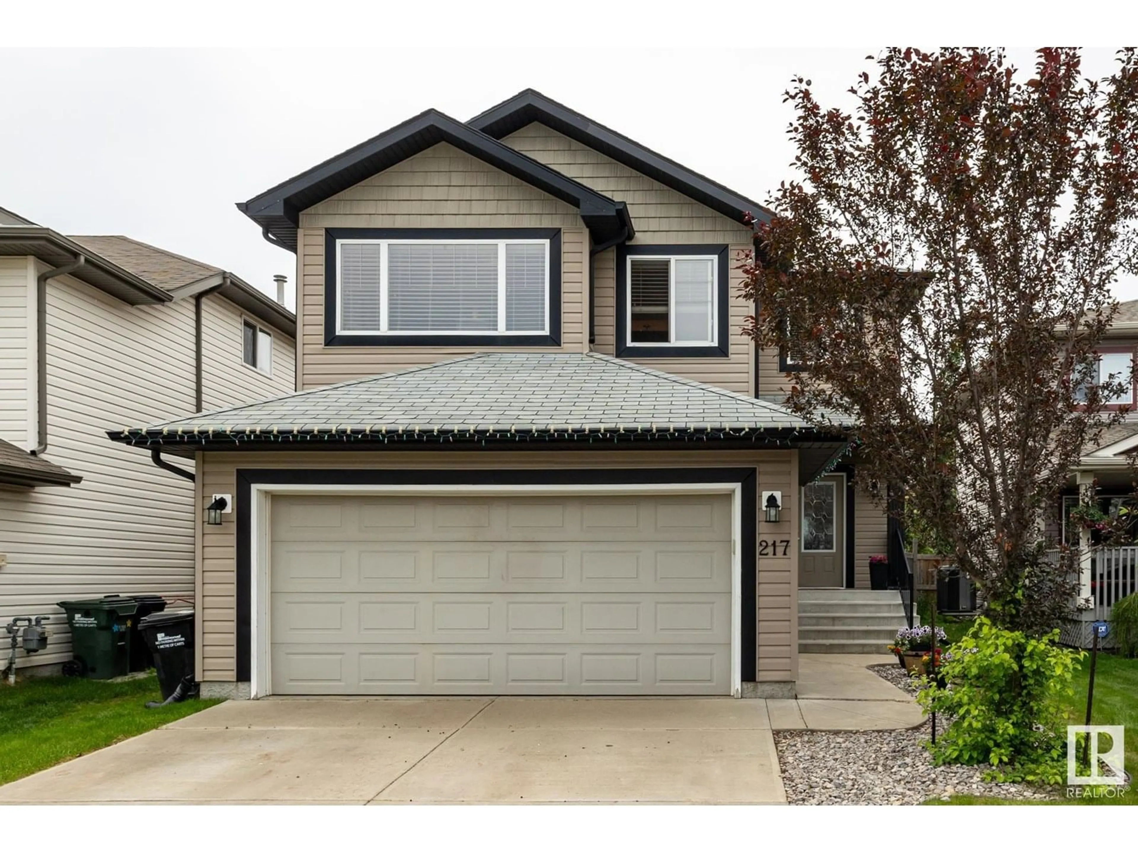 Home with vinyl exterior material, street for 217 FOXTIAL WY, Sherwood Park Alberta T8A3C2