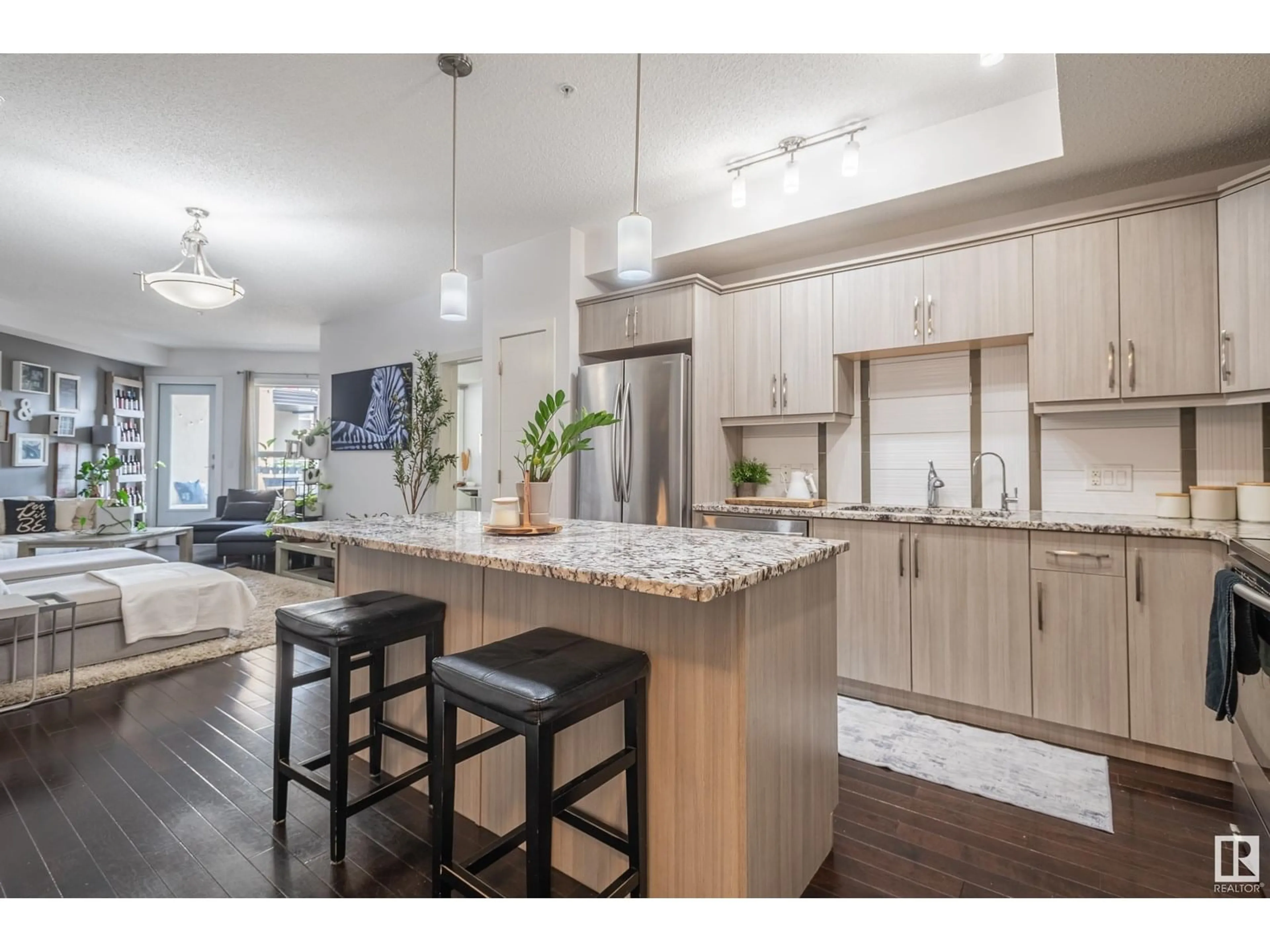 Open concept kitchen, wood/laminate floor for #305 - 10523 123 ST, Edmonton Alberta T5N1N9