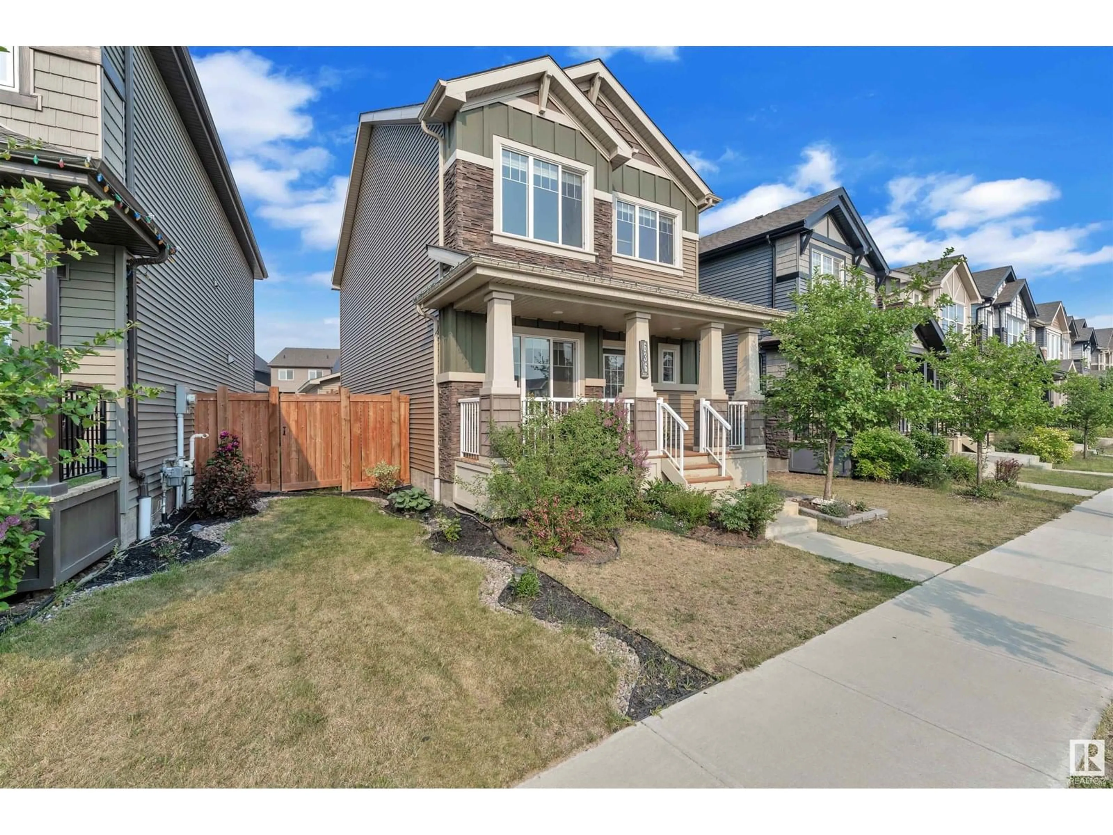 Home with vinyl exterior material, street for 636 ORCHARDS BV, Edmonton Alberta T6X2L4
