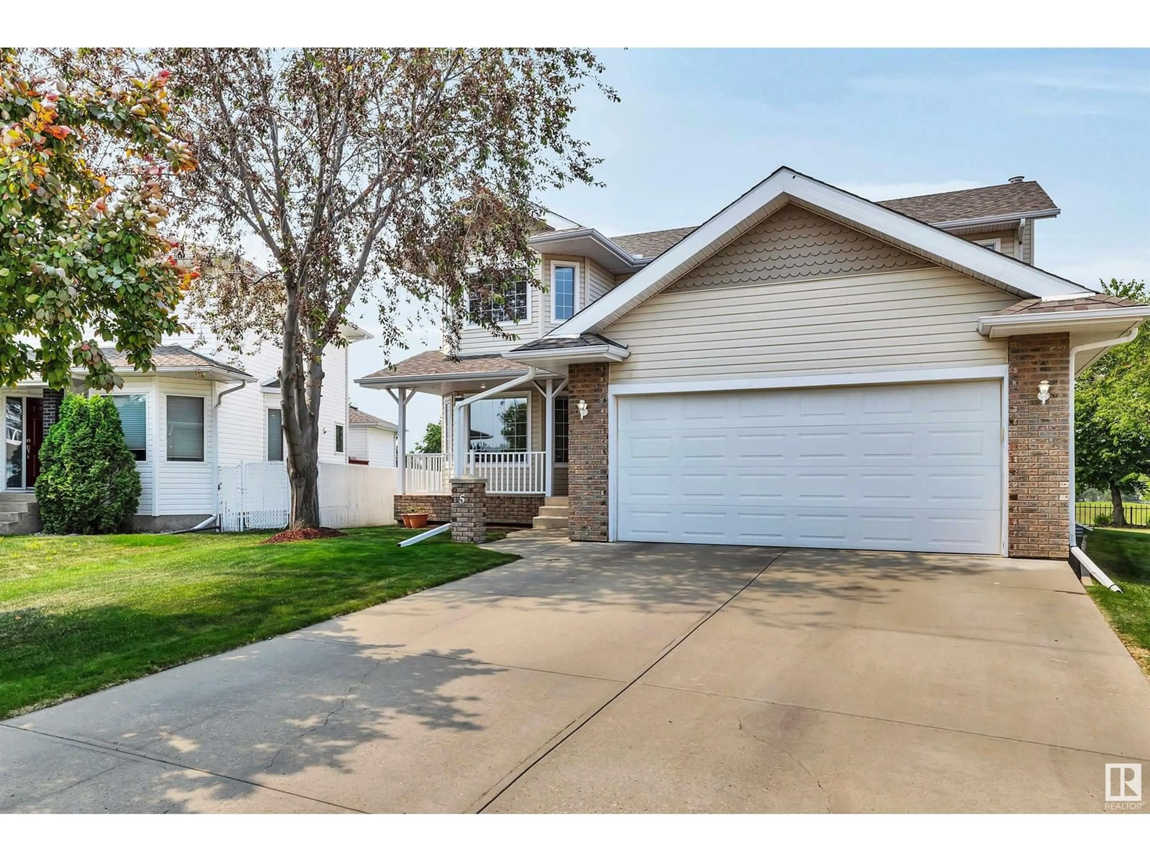 Home with vinyl exterior material, street for 5 COLONIALE CL, Beaumont Alberta T4X1M5