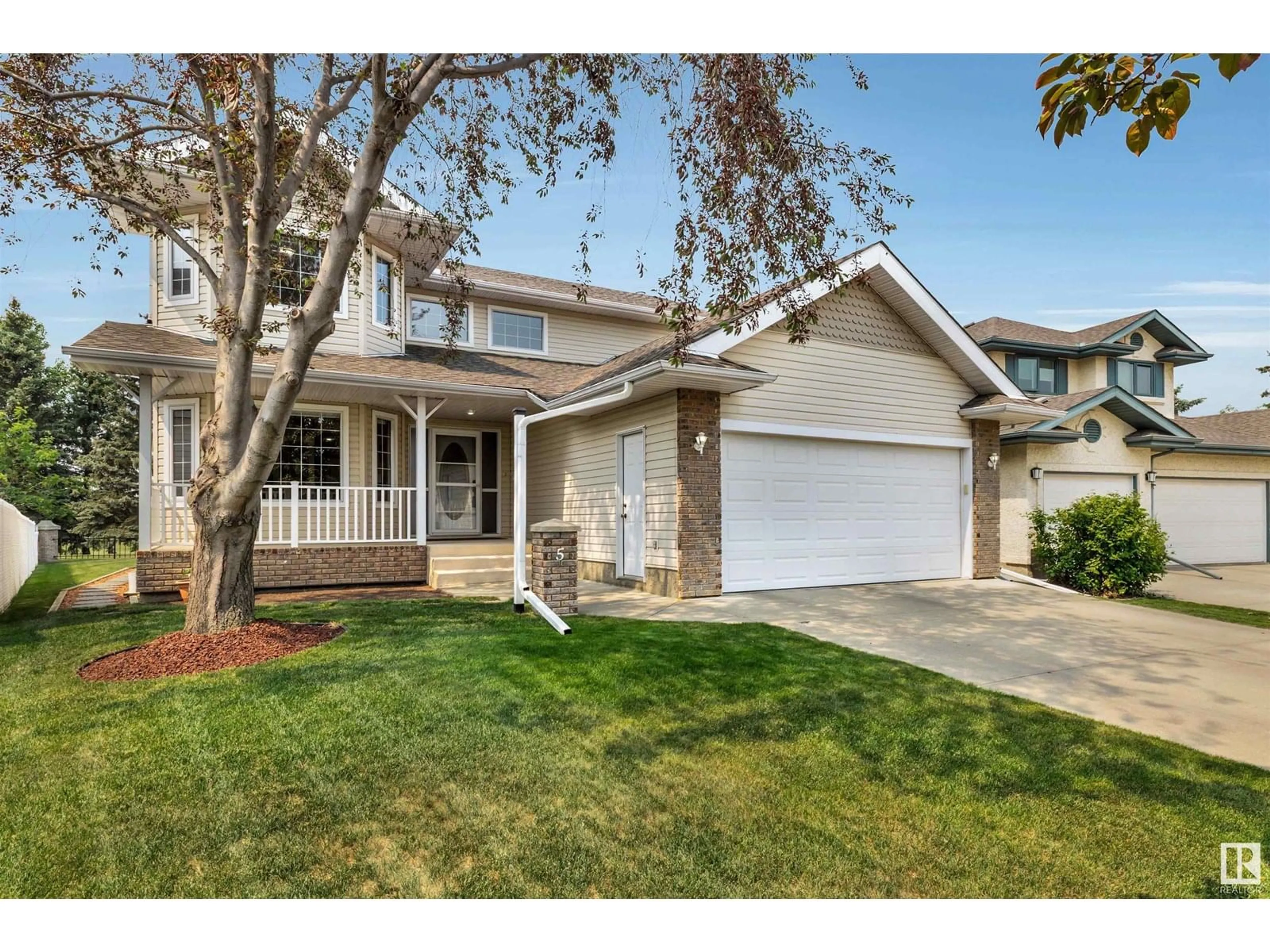 Home with vinyl exterior material, street for 5 COLONIALE CL, Beaumont Alberta T4X1M5