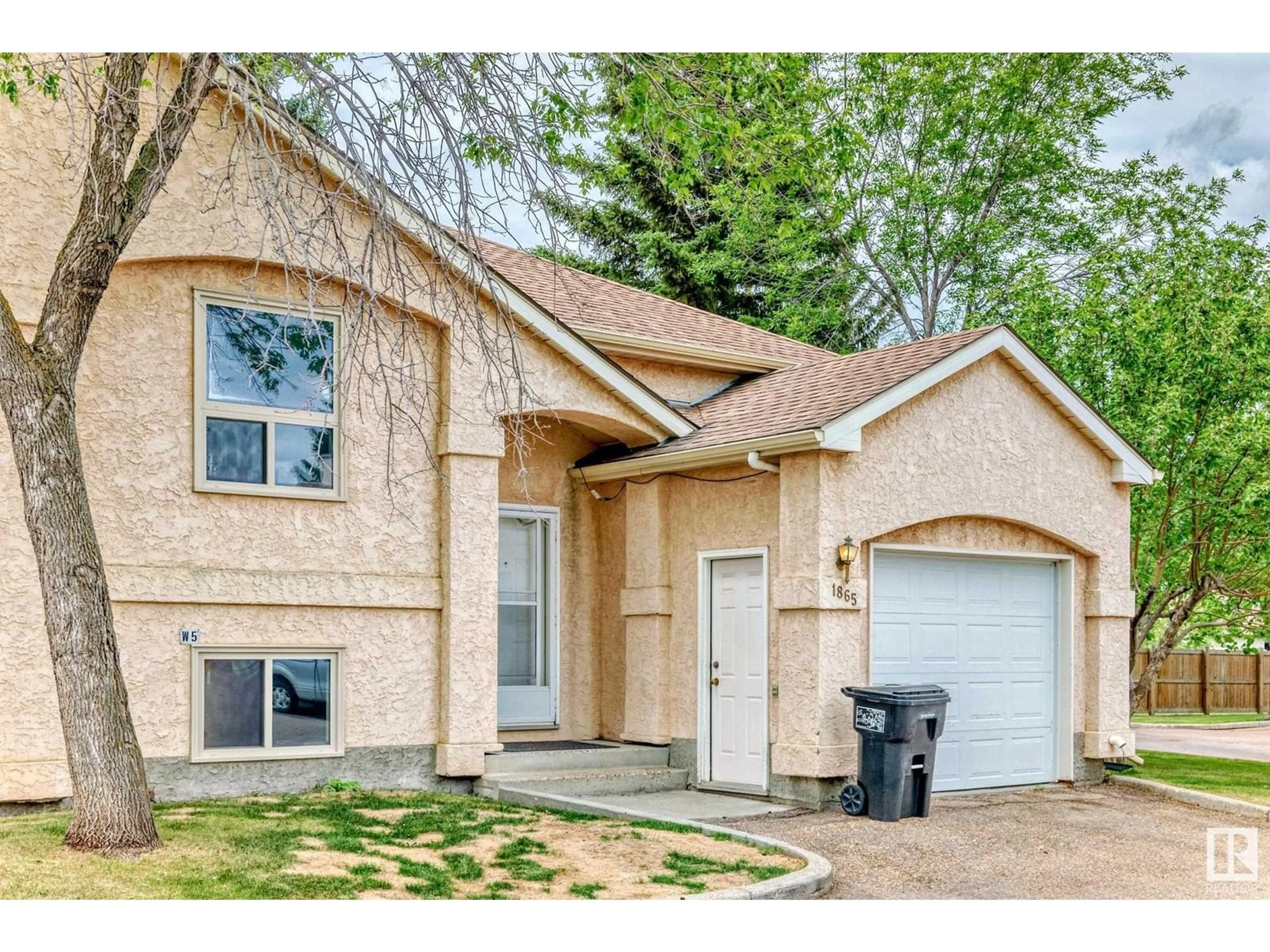 Home with brick exterior material, street for 1865 MILL WOODS RD E, Edmonton Alberta T6L6K2