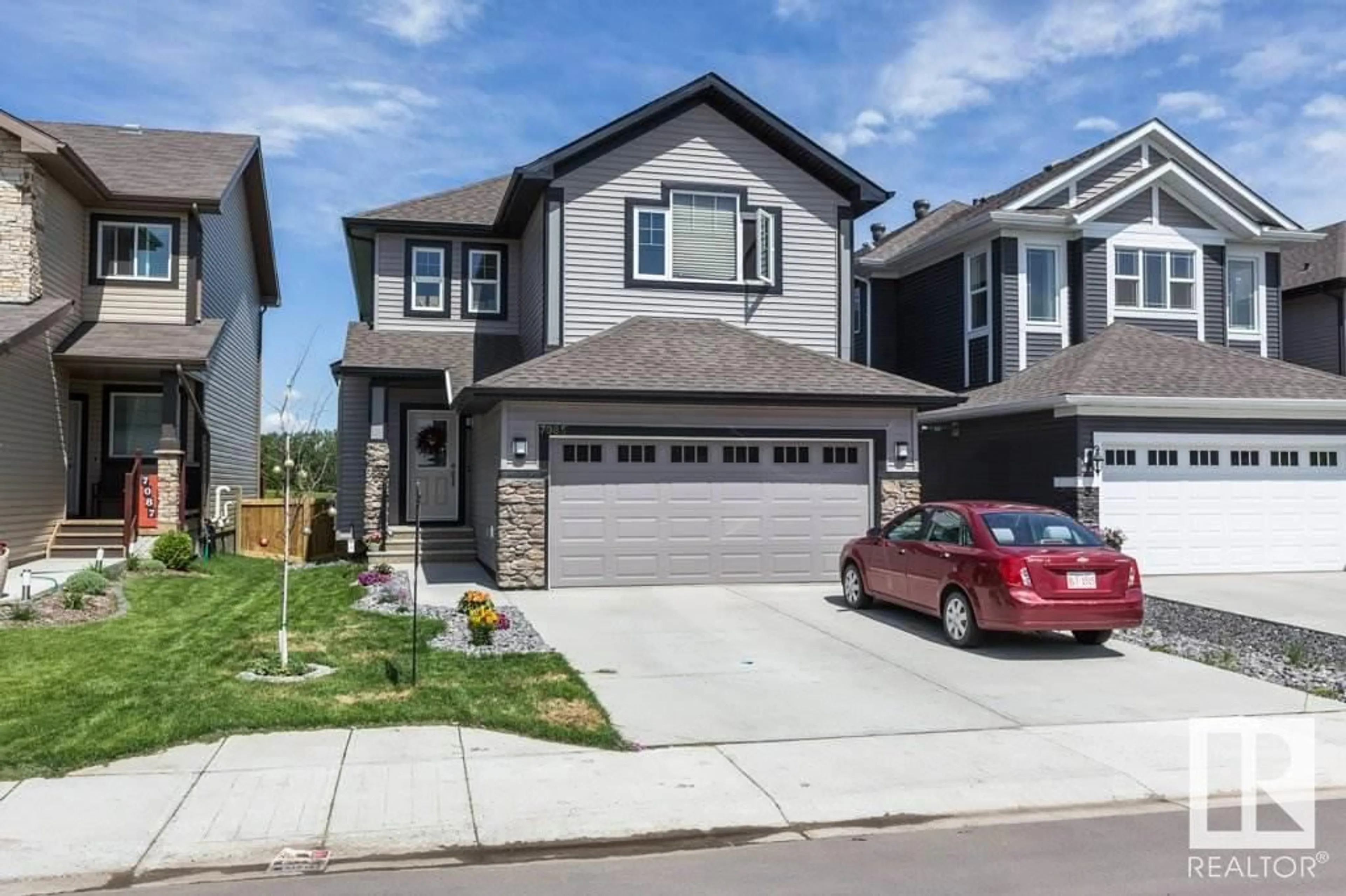 Home with vinyl exterior material, street for SW - 7085 ARMOUR BN, Edmonton Alberta T6W2N9