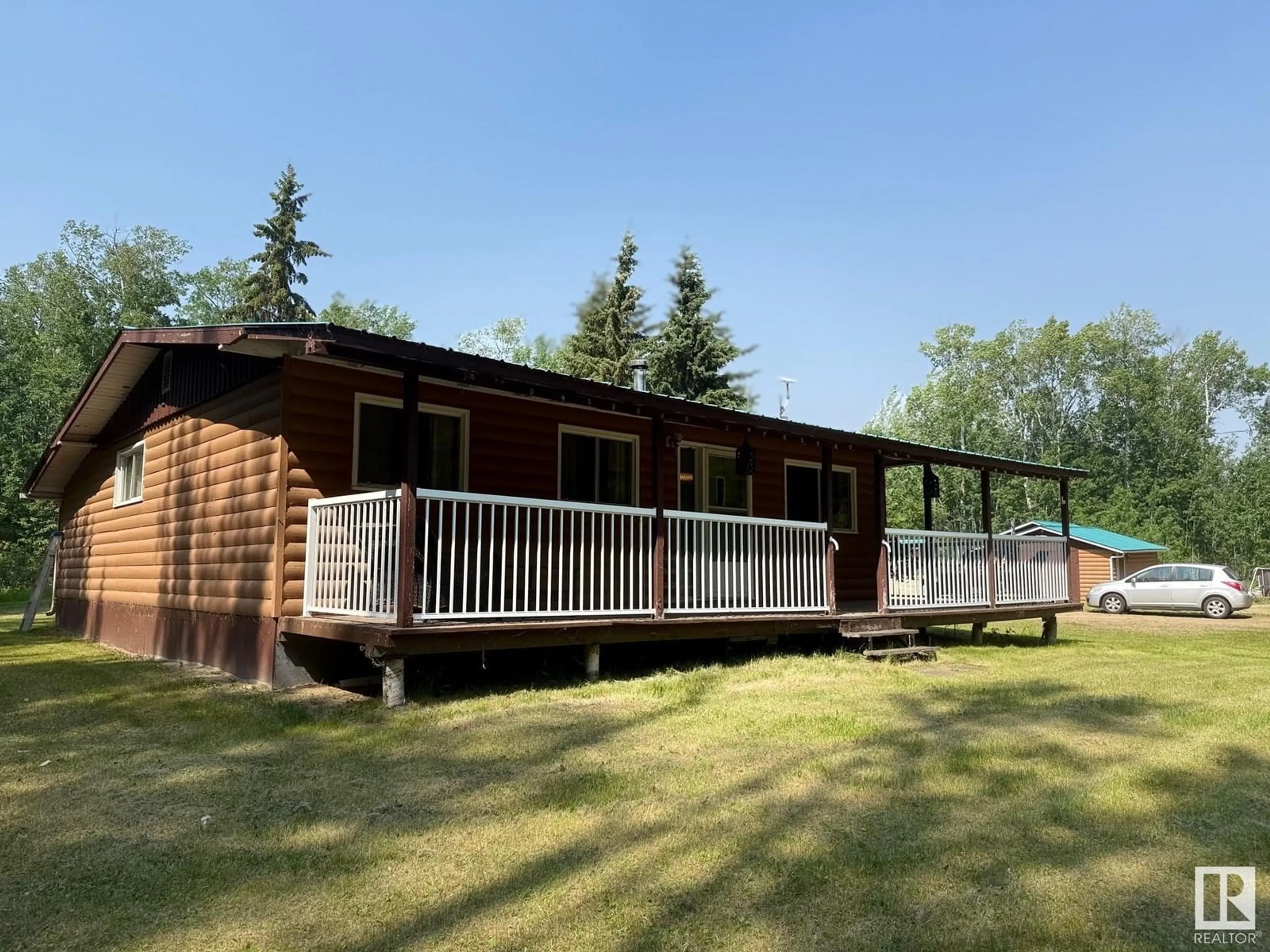 A pic from outside/outdoor area/front of a property/back of a property/a pic from drone, building for 16466 HWY 663, Rural Athabasca County Alberta T0A0R0