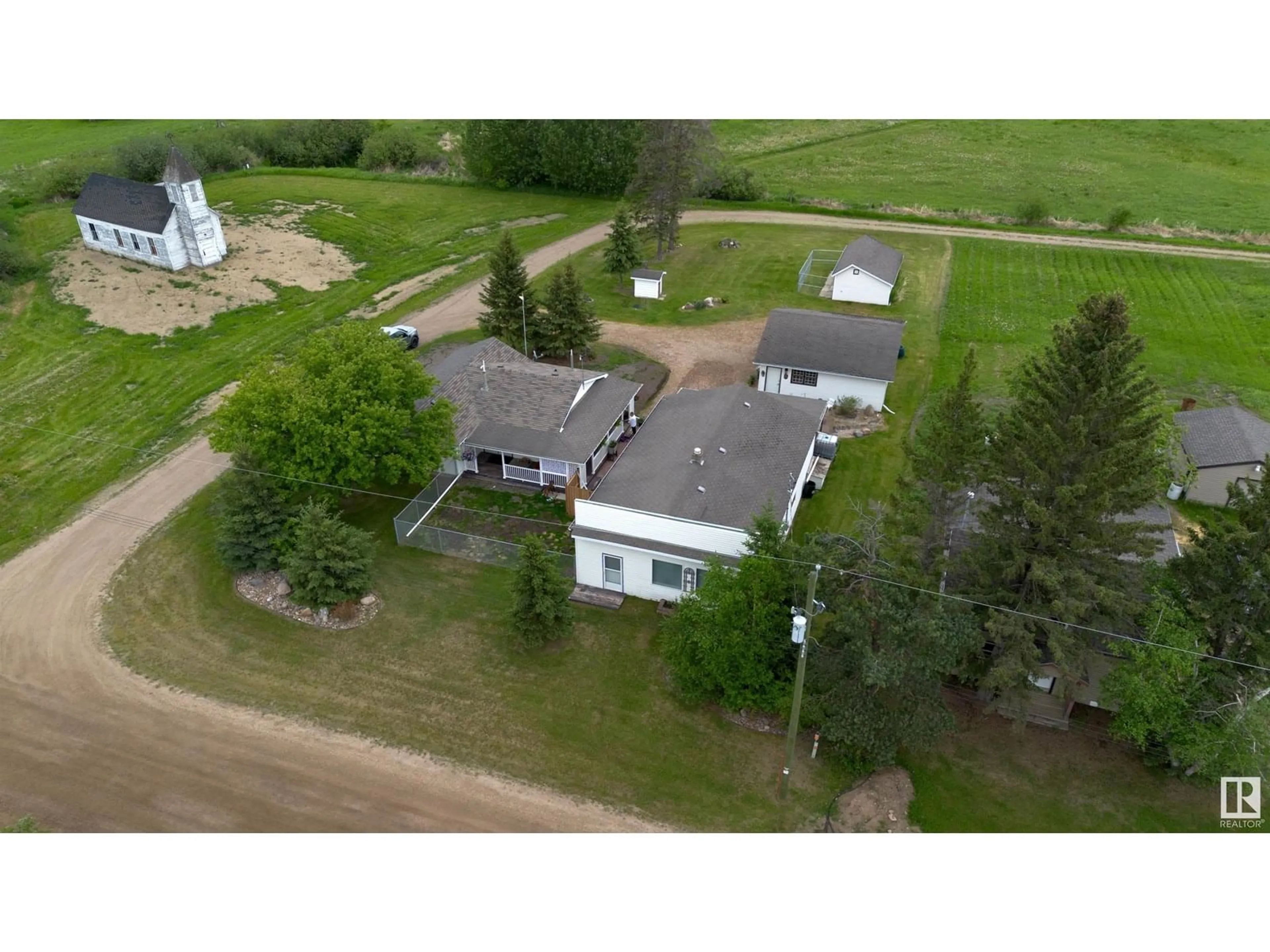 A pic from outside/outdoor area/front of a property/back of a property/a pic from drone, unknown for 5111 50 ST, Tawatinaw Alberta T0G2E0