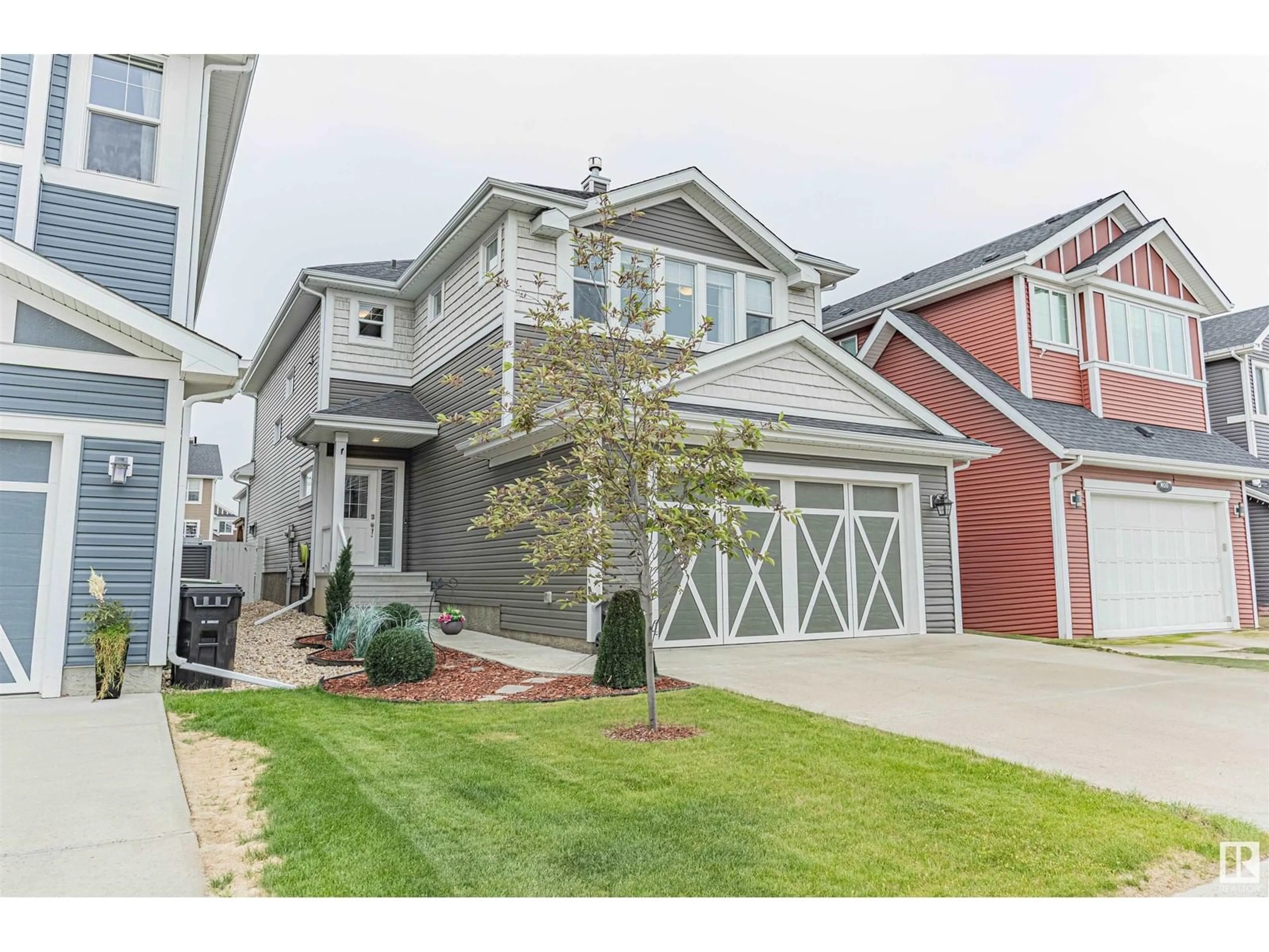 Home with vinyl exterior material, street for 387 SIMPKINS WD, Leduc Alberta T9E0Y4