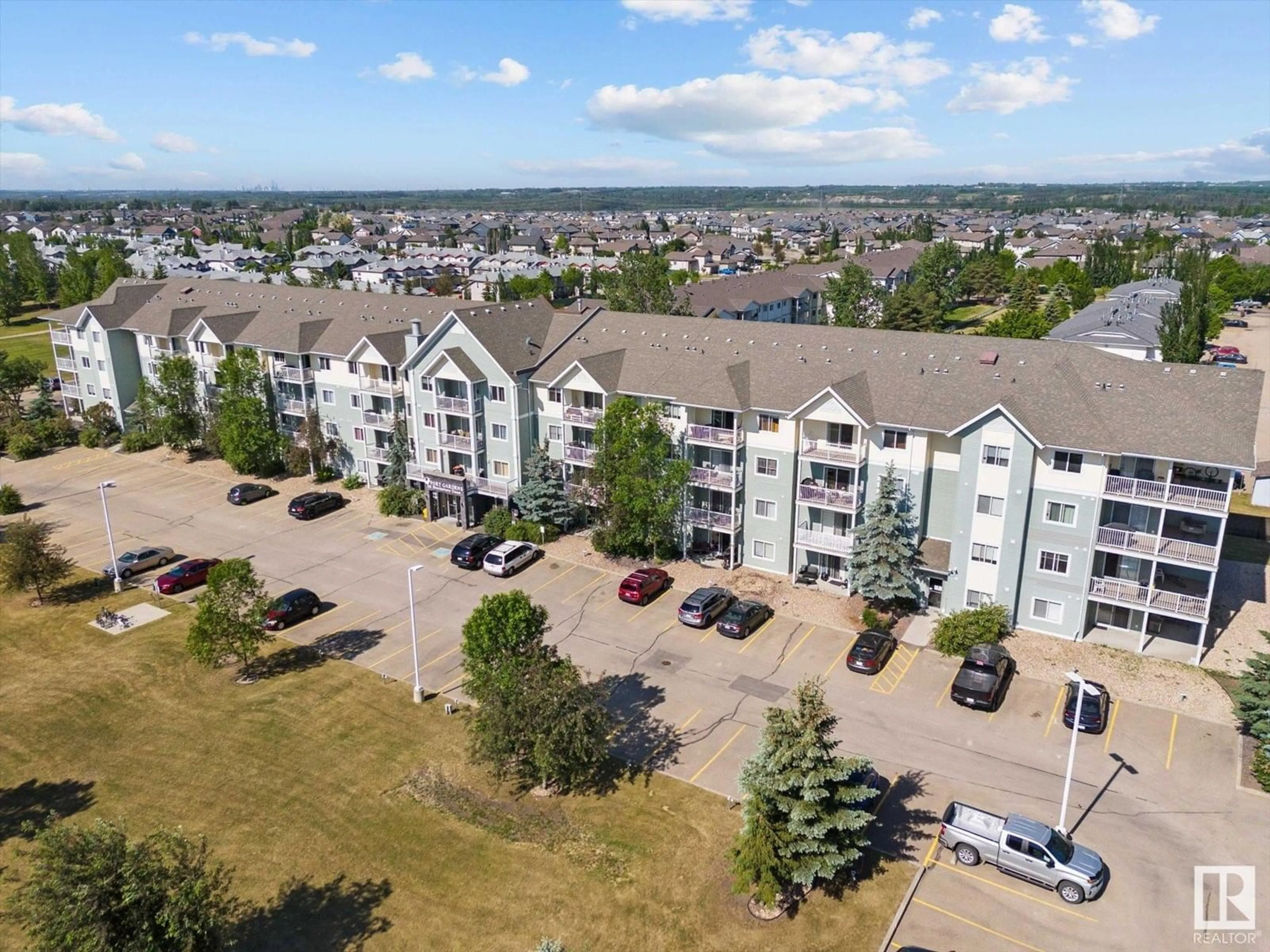A pic from outside/outdoor area/front of a property/back of a property/a pic from drone, unknown for 50 - 433 WOODSMERE, Fort Saskatchewan Alberta T8L4N9