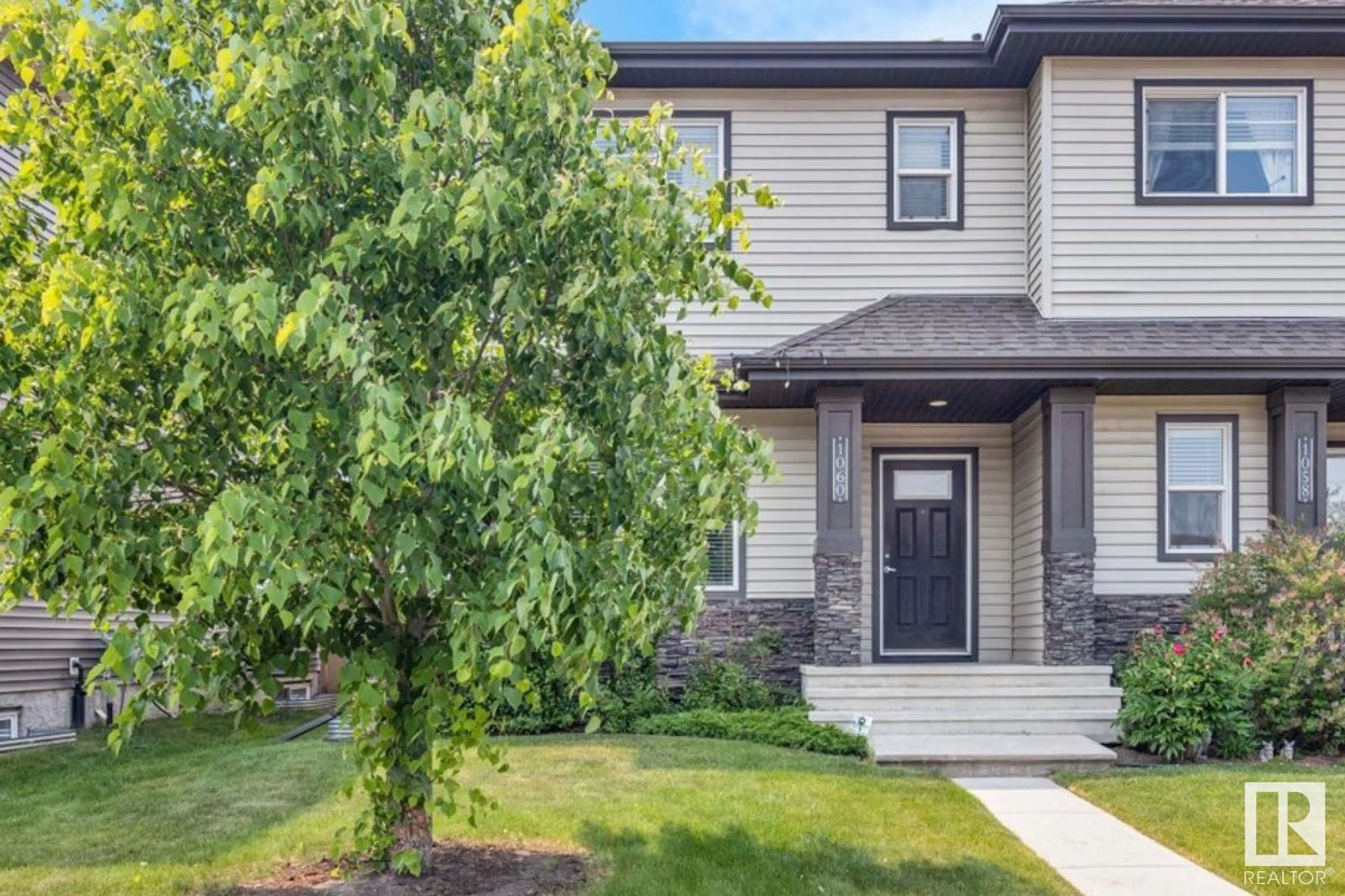 Home with vinyl exterior material, street for PM SW - 1060 WATT PROMENADE, Edmonton Alberta T6X1T7