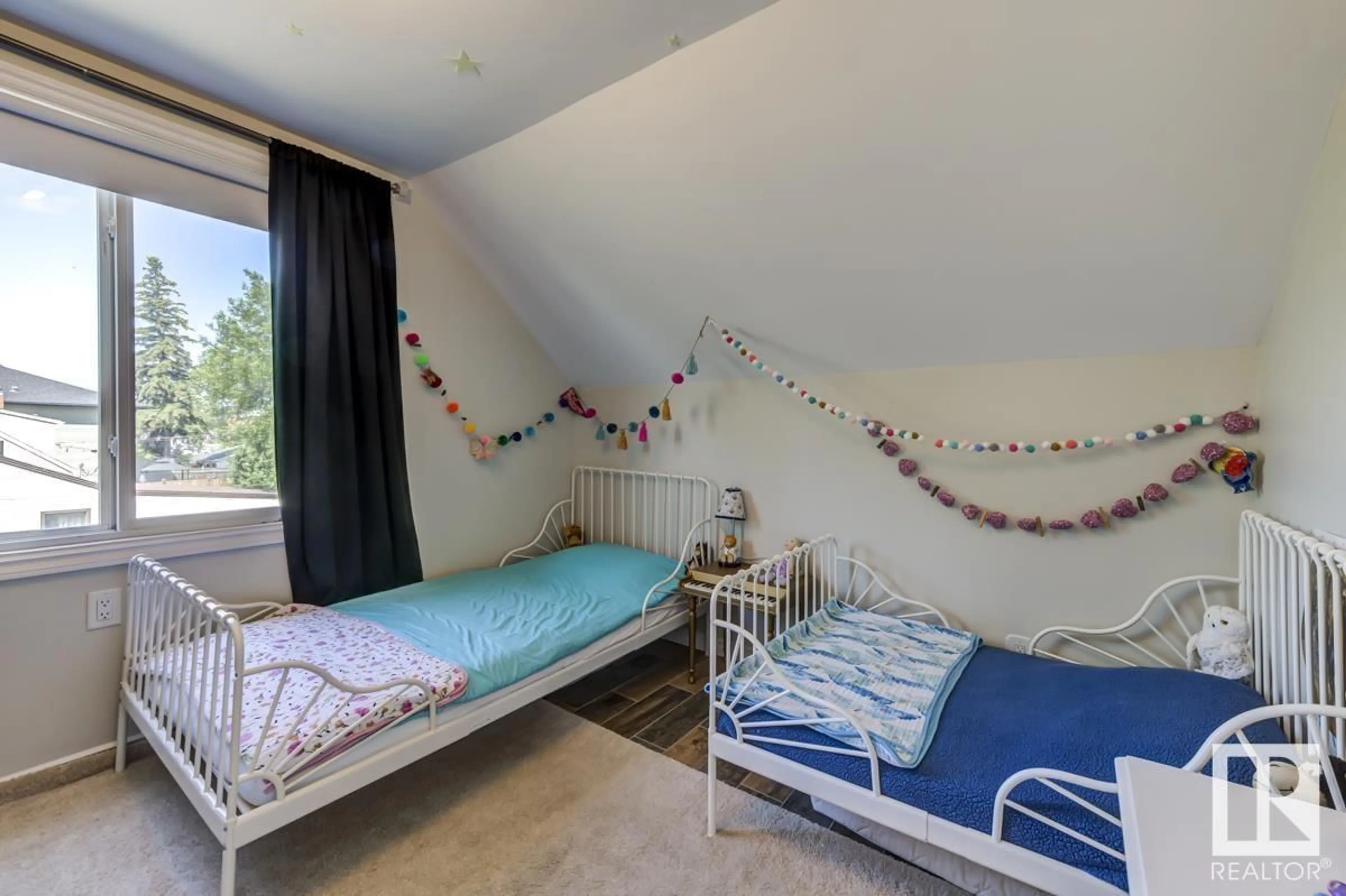 Bedroom with bed, unknown for 8130 77 AV, Edmonton Alberta T6C0L2