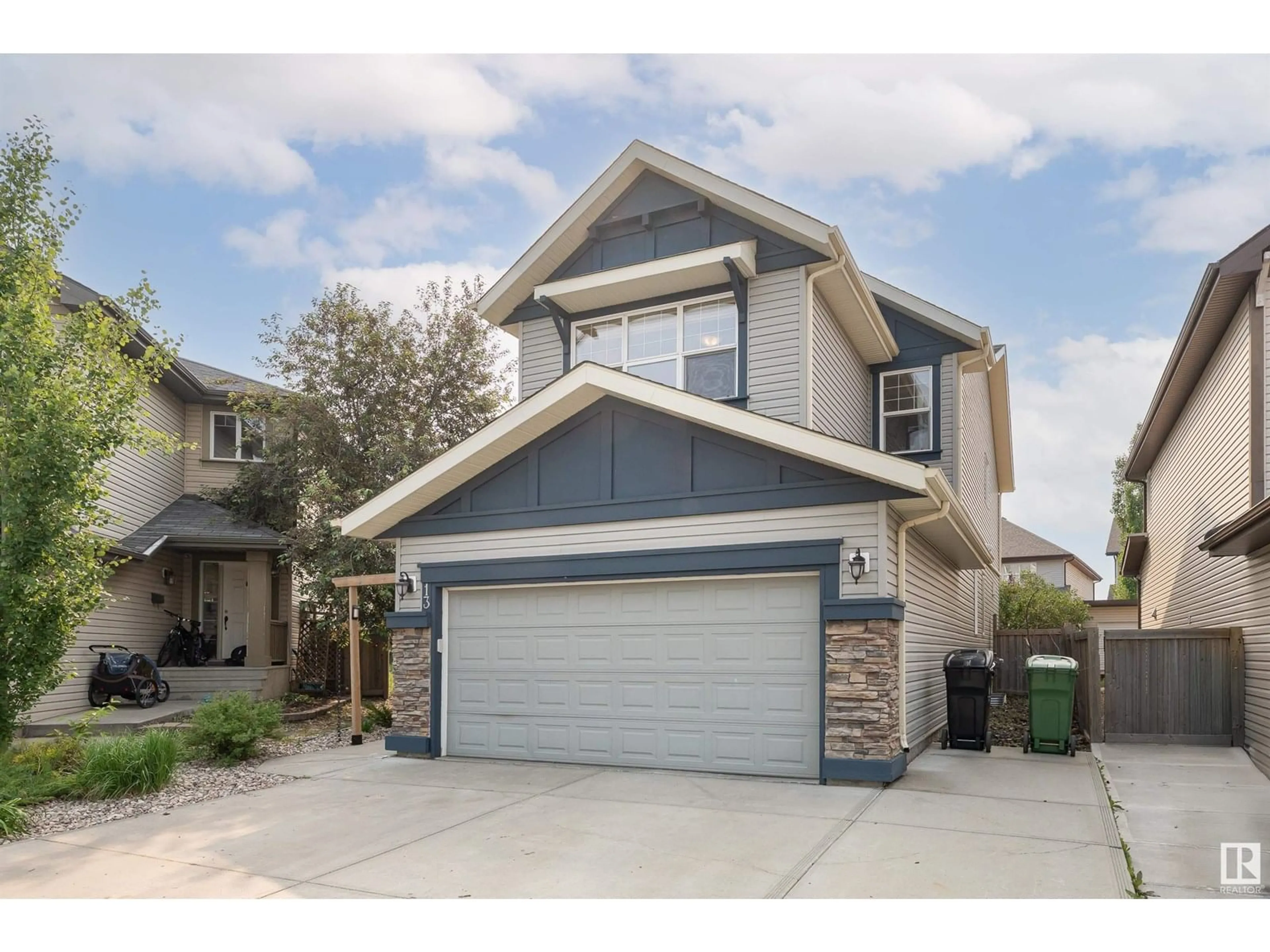 Home with vinyl exterior material, street for 13 BECKER CR, Fort Saskatchewan Alberta T8L0C1