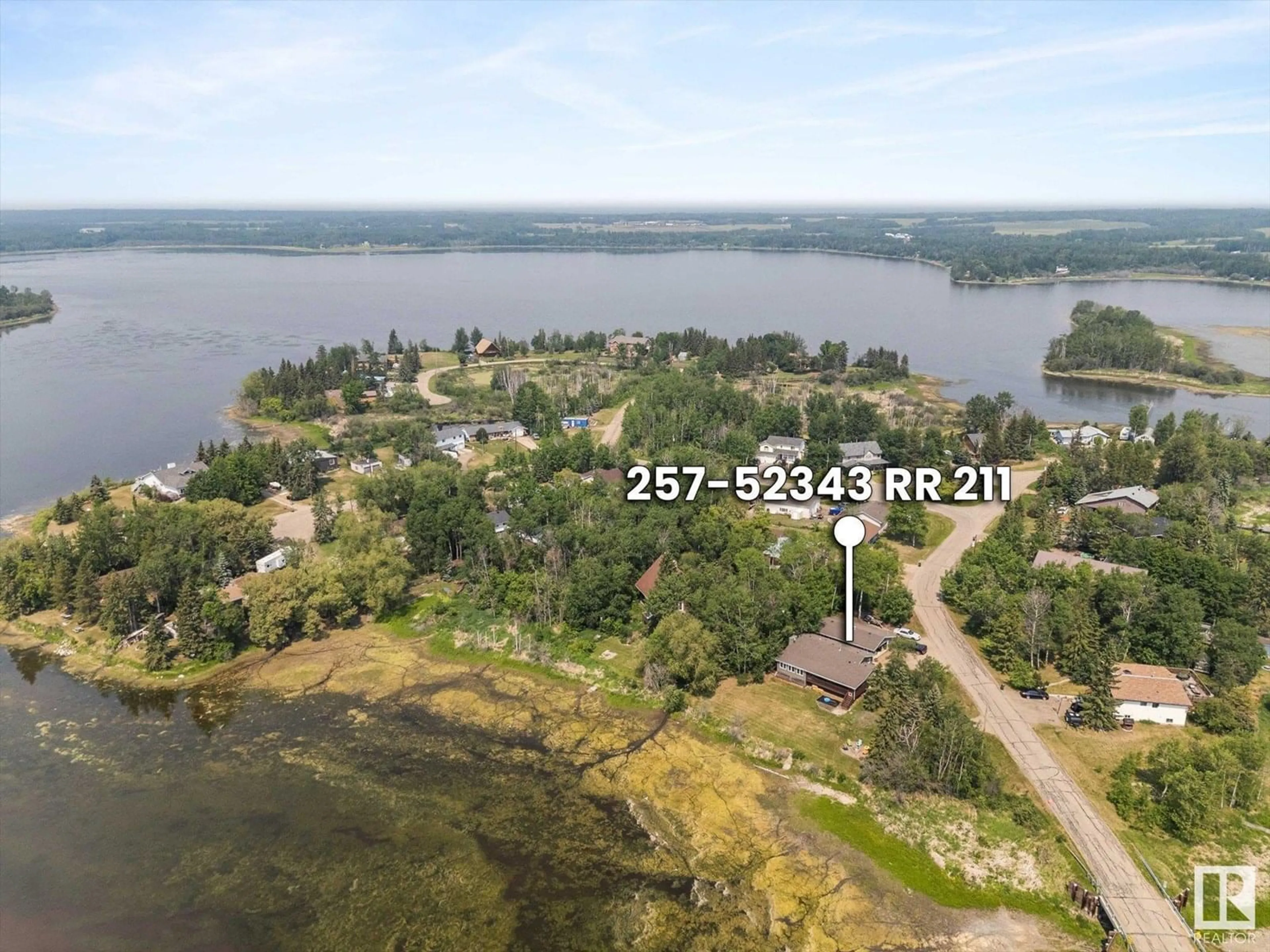 A pic from outside/outdoor area/front of a property/back of a property/a pic from drone, water/lake/river/ocean view for 257 - 52343 RGE ROAD 211, Rural Strathcona County Alberta T8G1A6