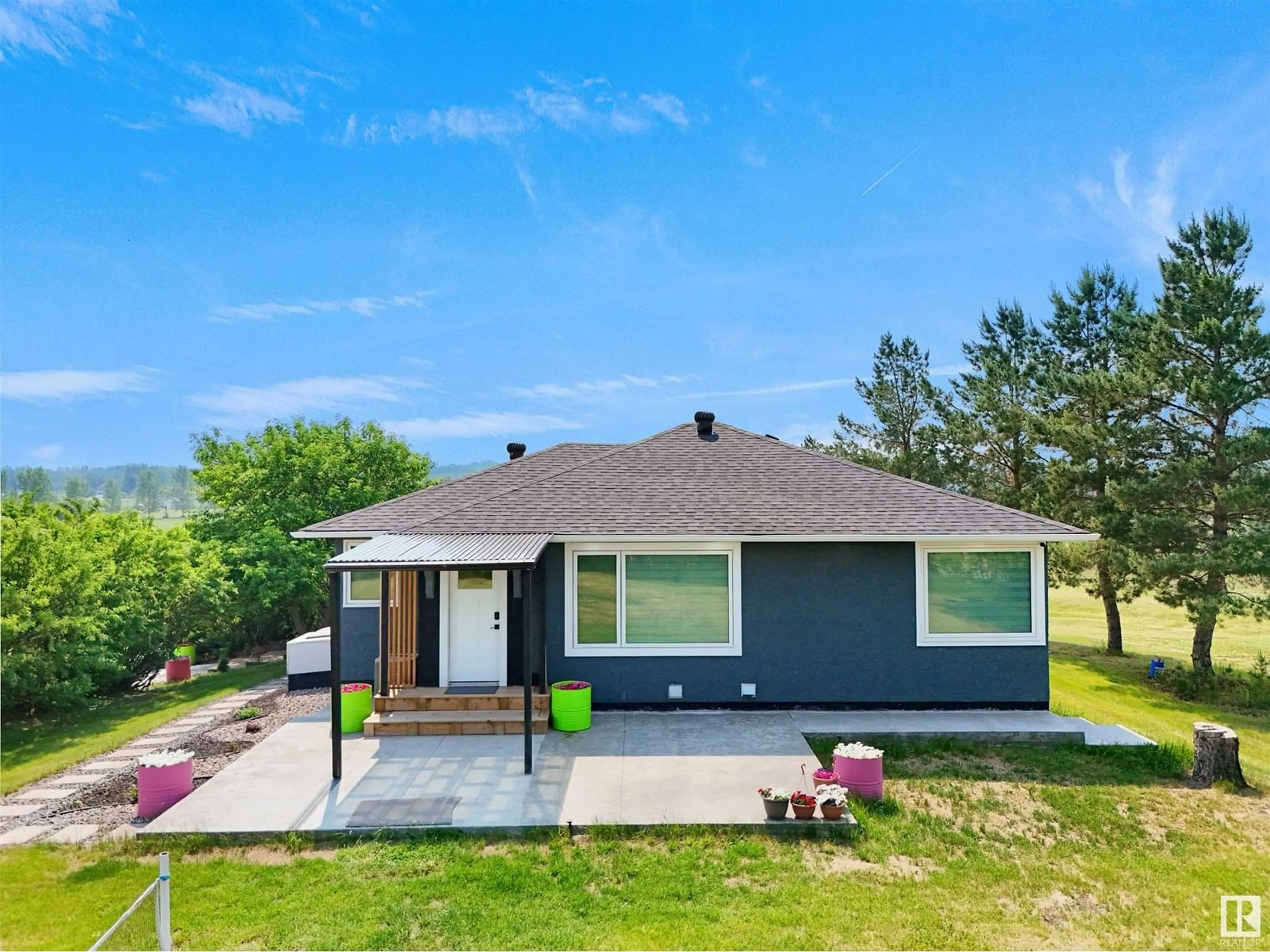 A pic from outside/outdoor area/front of a property/back of a property/a pic from drone, unknown for 22517 WYE RD, Rural Strathcona County Alberta T8C1H9