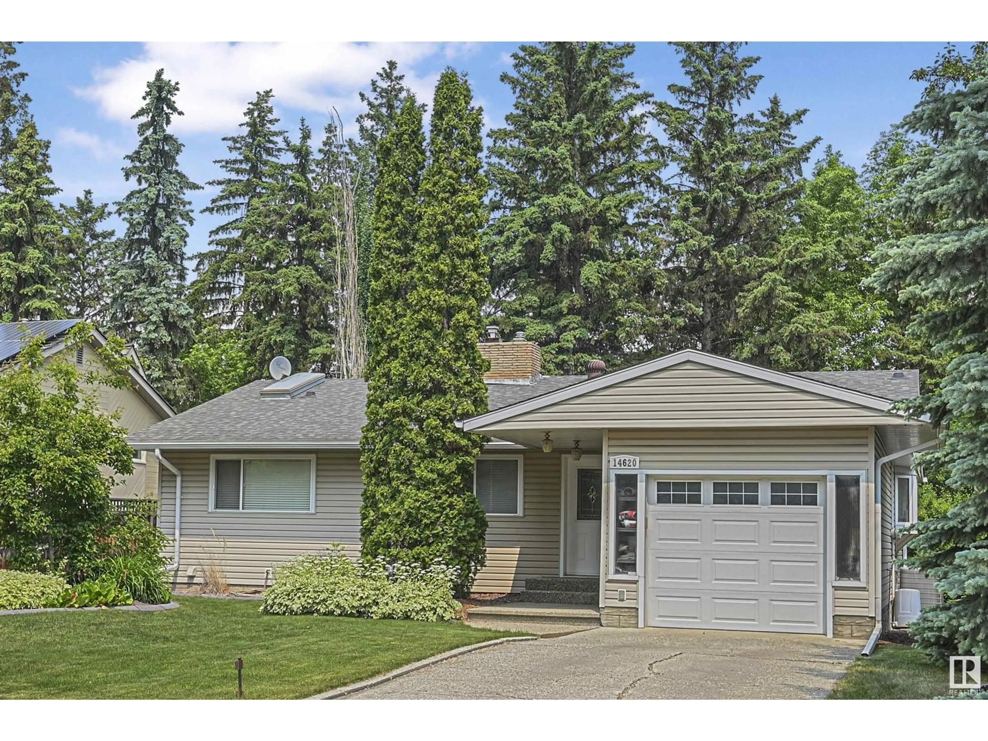 Home with vinyl exterior material, street for 14620 PARK DR, Edmonton Alberta T5R5V4