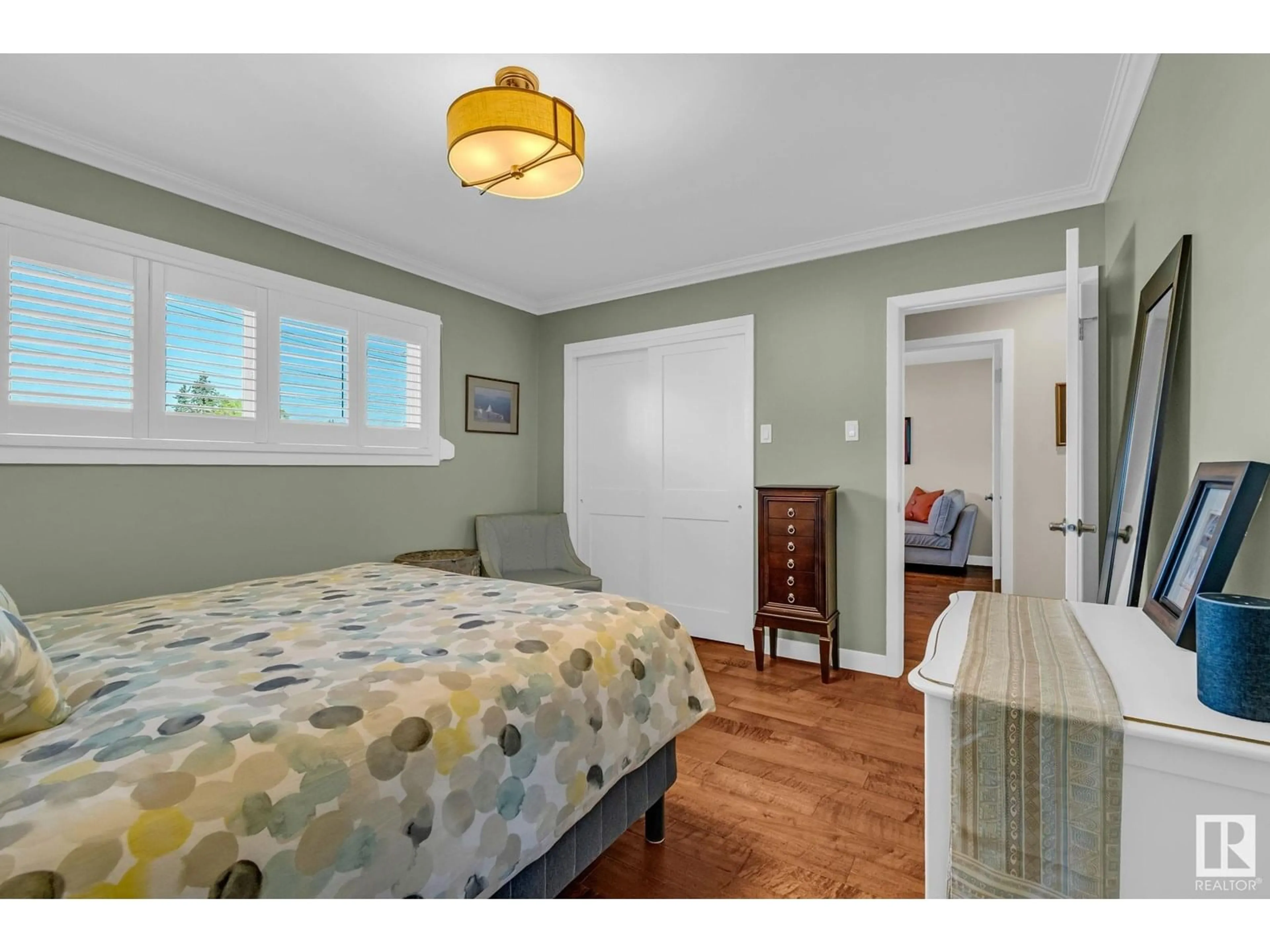 Bedroom with bed, wood/laminate floor for NW - 4916 112 ST, Edmonton Alberta T6H3H9
