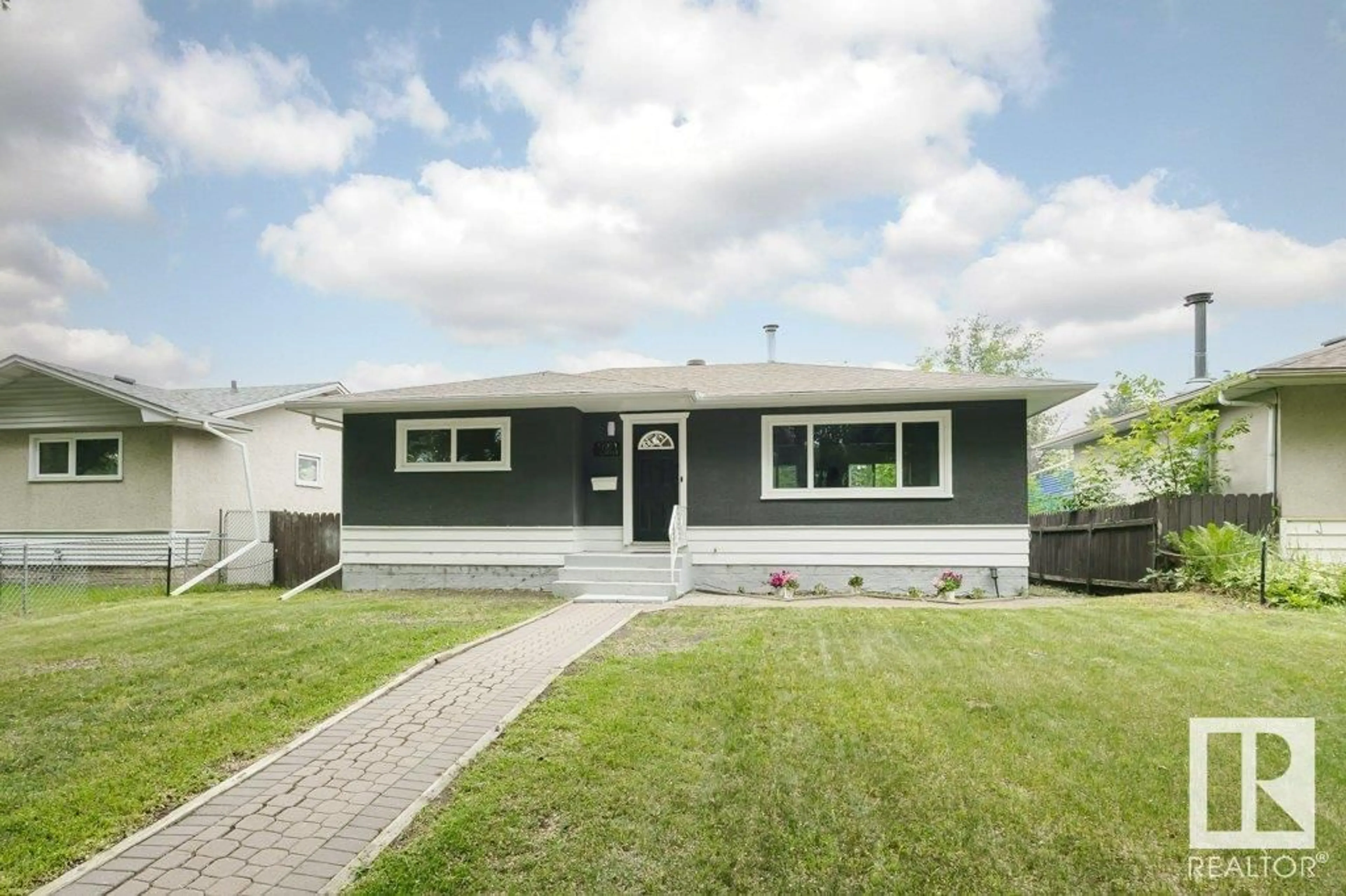 Home with vinyl exterior material, street for 11921 41 ST, Edmonton Alberta T5W2M1