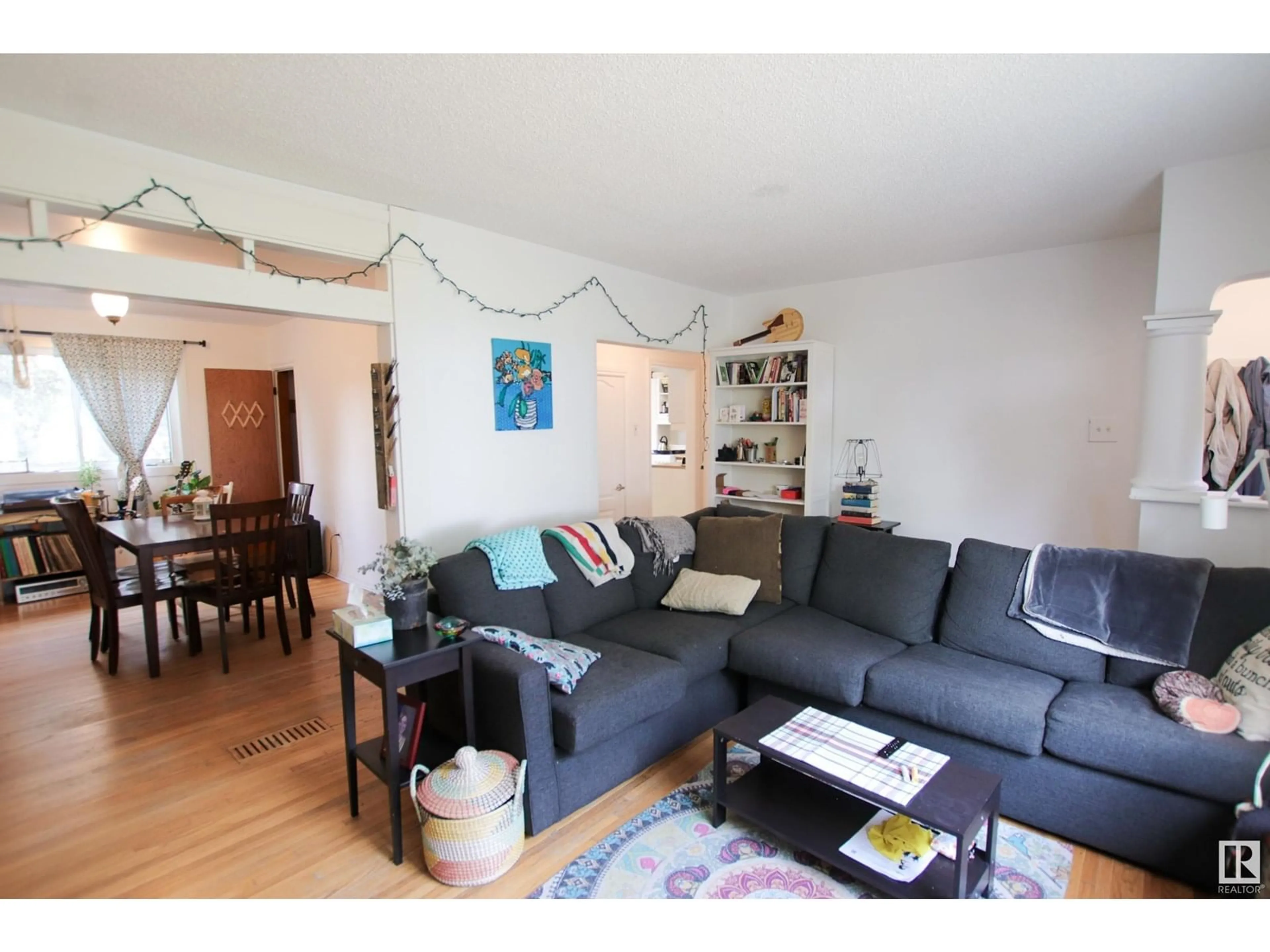 Living room with furniture, unknown for 10544 66 AV, Edmonton Alberta T6H1X4