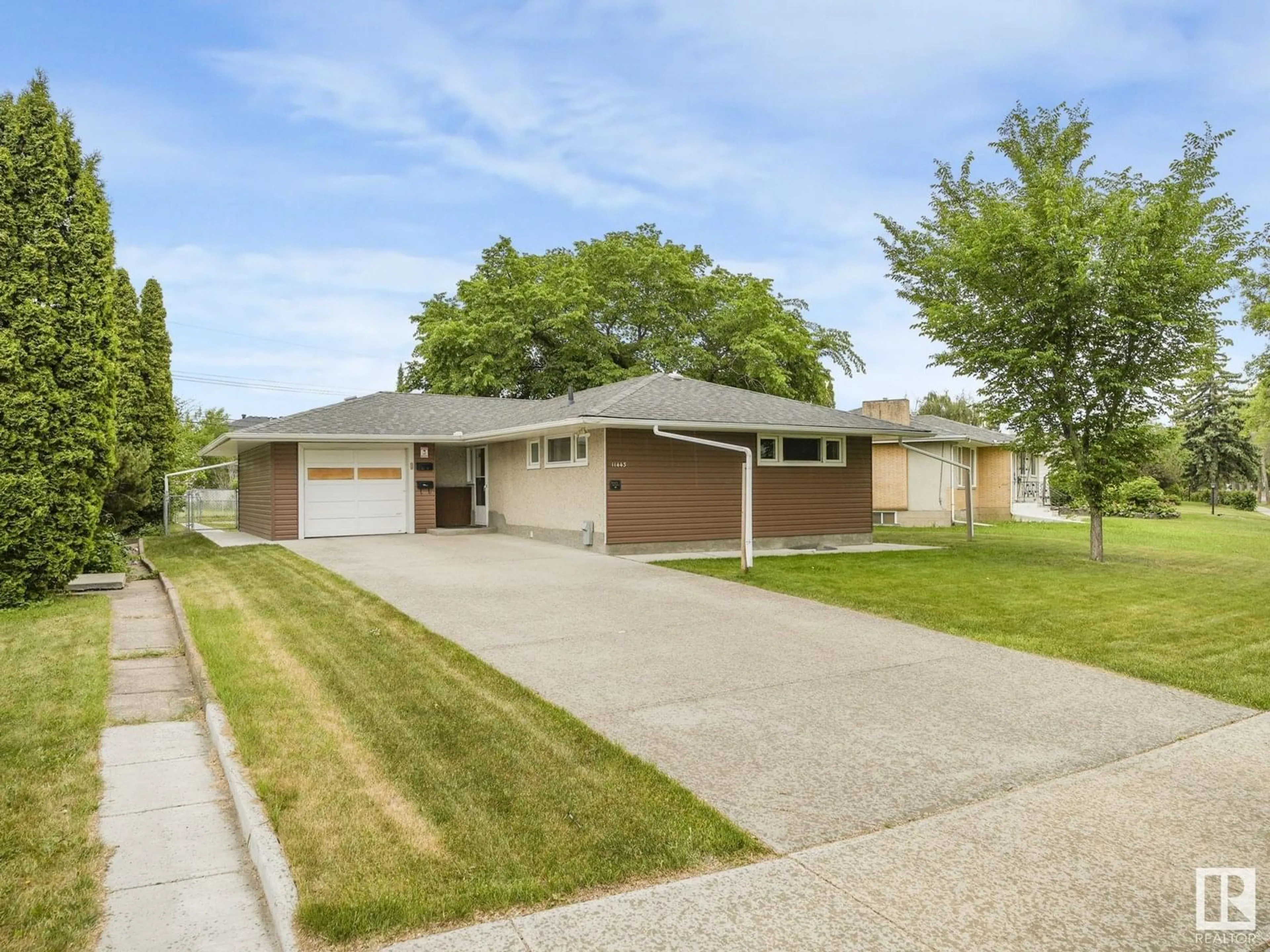 Home with brick exterior material, street for 11443 105 ST, Edmonton Alberta T5G2M9