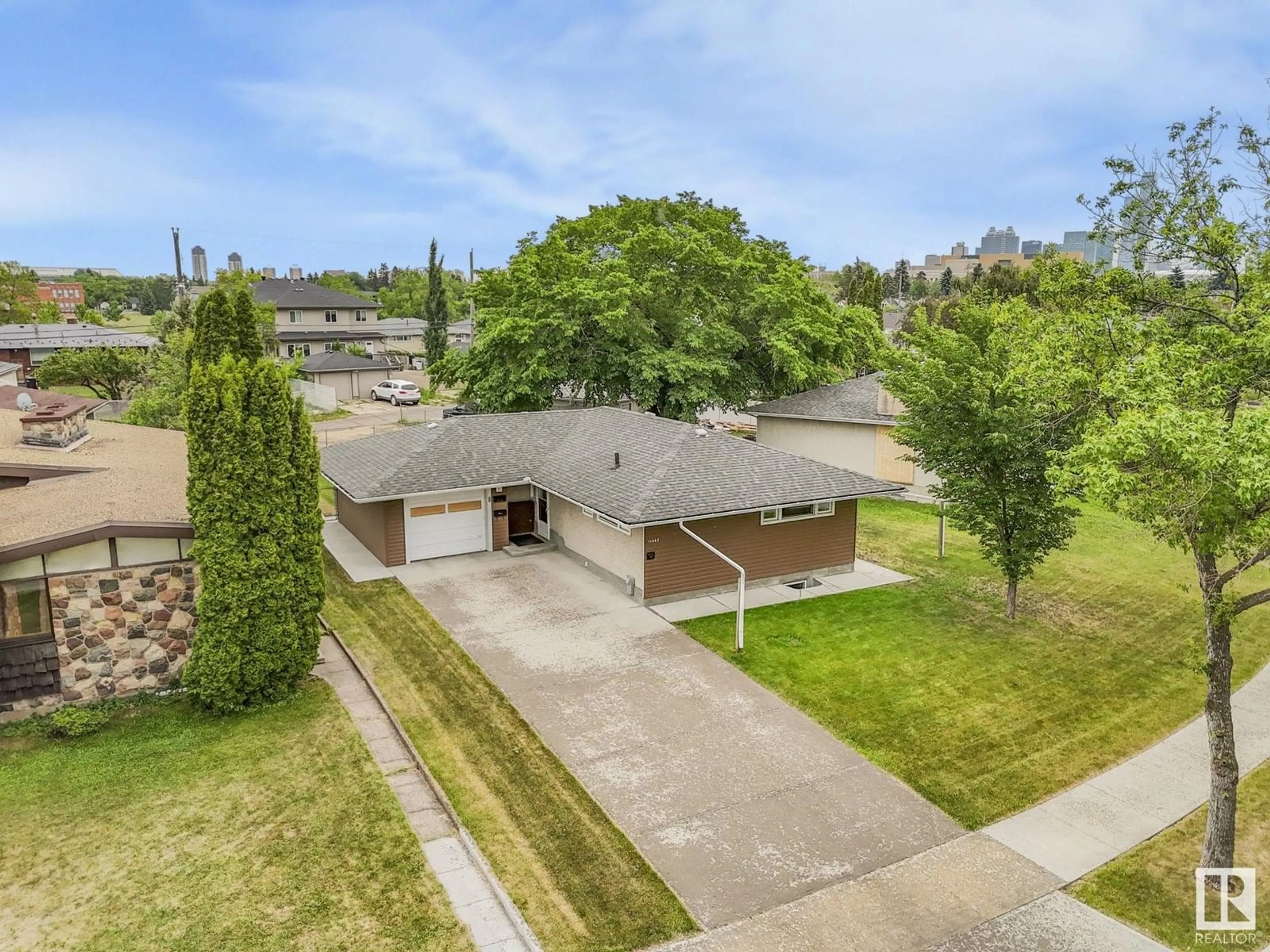 A pic from outside/outdoor area/front of a property/back of a property/a pic from drone, street for 11443 105 ST, Edmonton Alberta T5G2M9