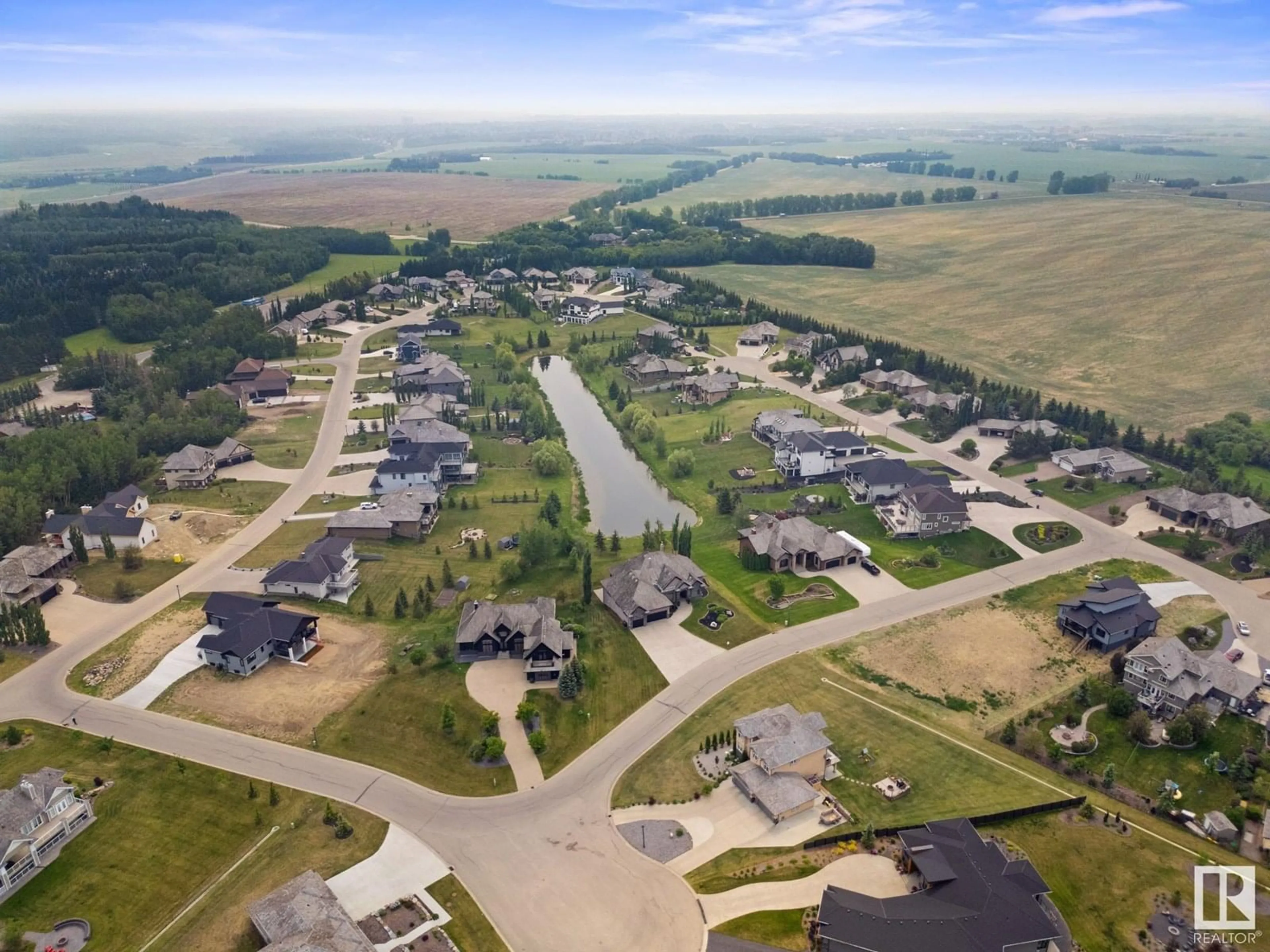 A pic from outside/outdoor area/front of a property/back of a property/a pic from drone, water/lake/river/ocean view for 25214 - 72 COAL MINE RD, Rural Sturgeon County Alberta T8T0A8