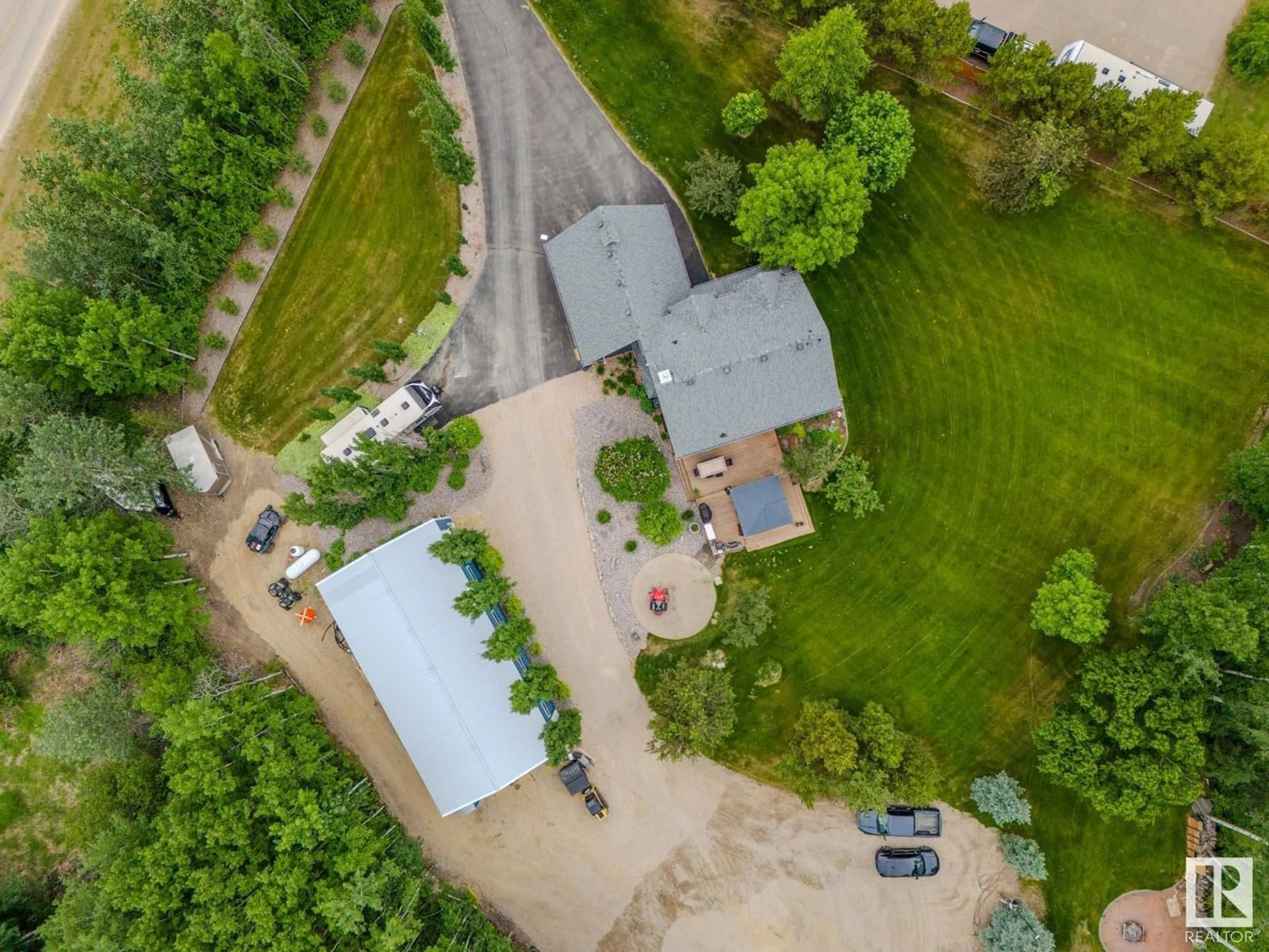 A pic from outside/outdoor area/front of a property/back of a property/a pic from drone, unknown for 4 - 4 TWP ROAD 540 TWP ROAD, Rural Parkland County Alberta T7X3V4