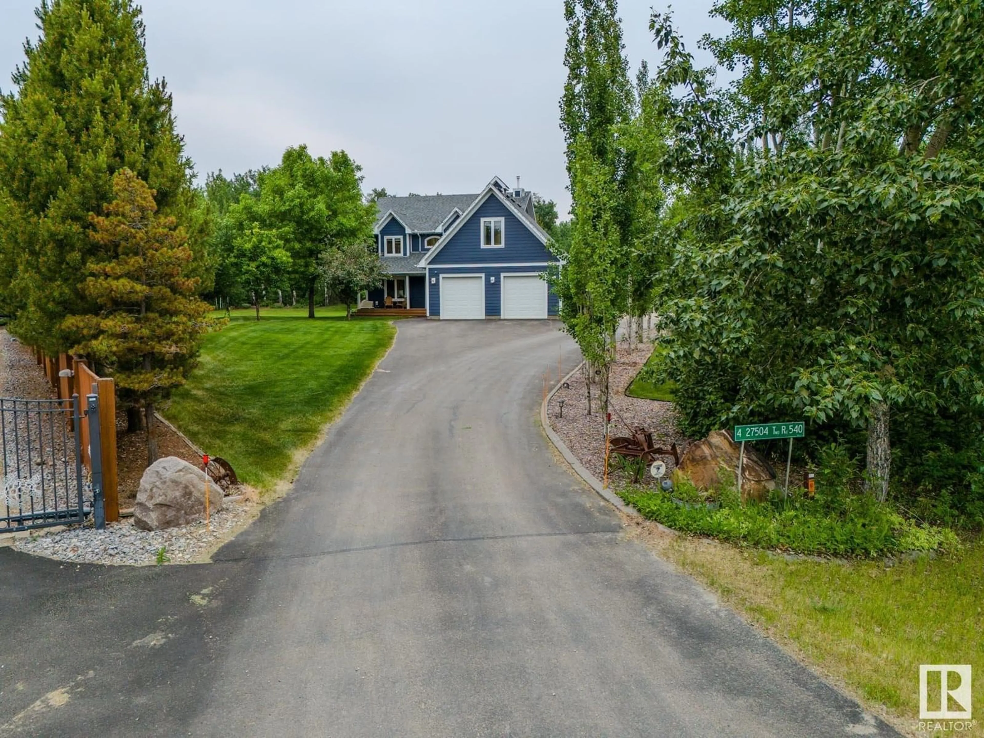 A pic from outside/outdoor area/front of a property/back of a property/a pic from drone, unknown for 4 - 4 TWP ROAD 540 TWP ROAD, Rural Parkland County Alberta T7X3V4