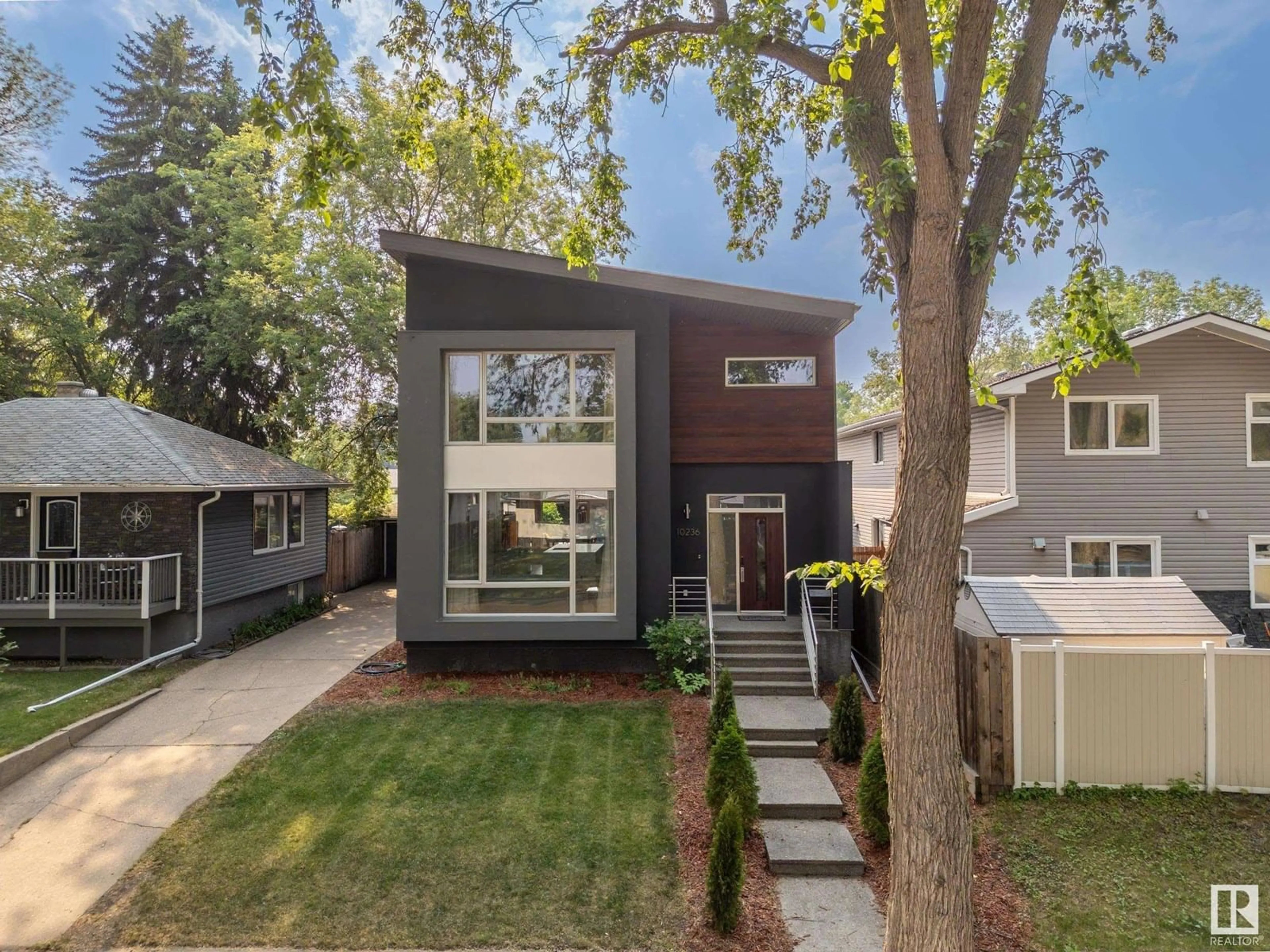 Home with brick exterior material, street for NW - 10236 78 ST, Edmonton Alberta T6A3E3