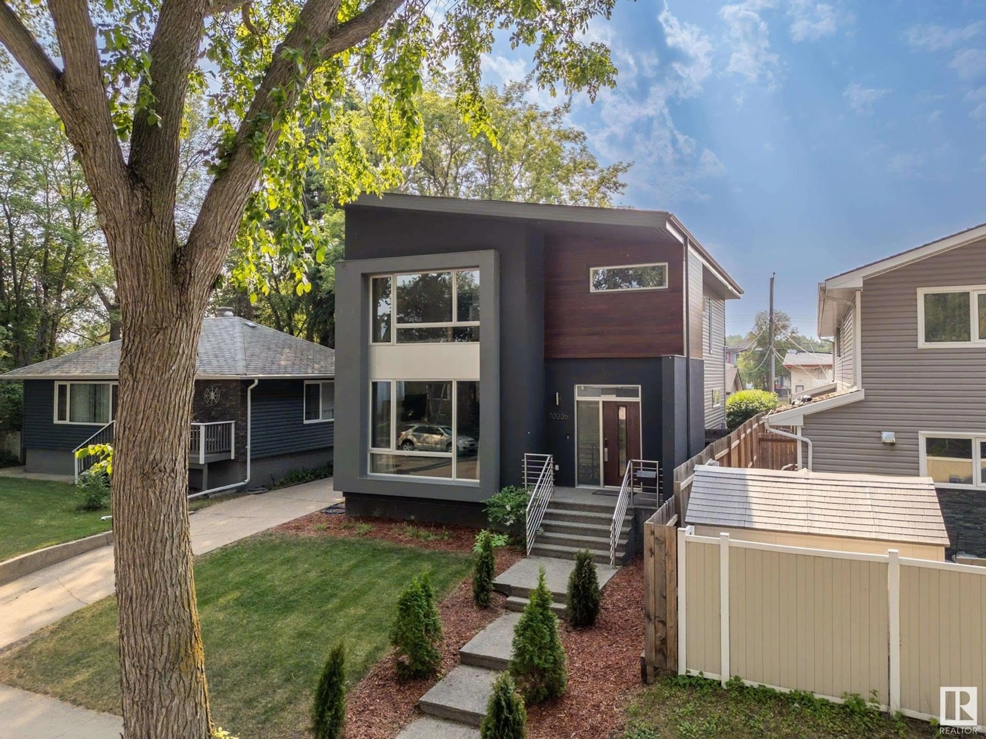 Home with vinyl exterior material, street for NW - 10236 78 ST, Edmonton Alberta T6A3E3