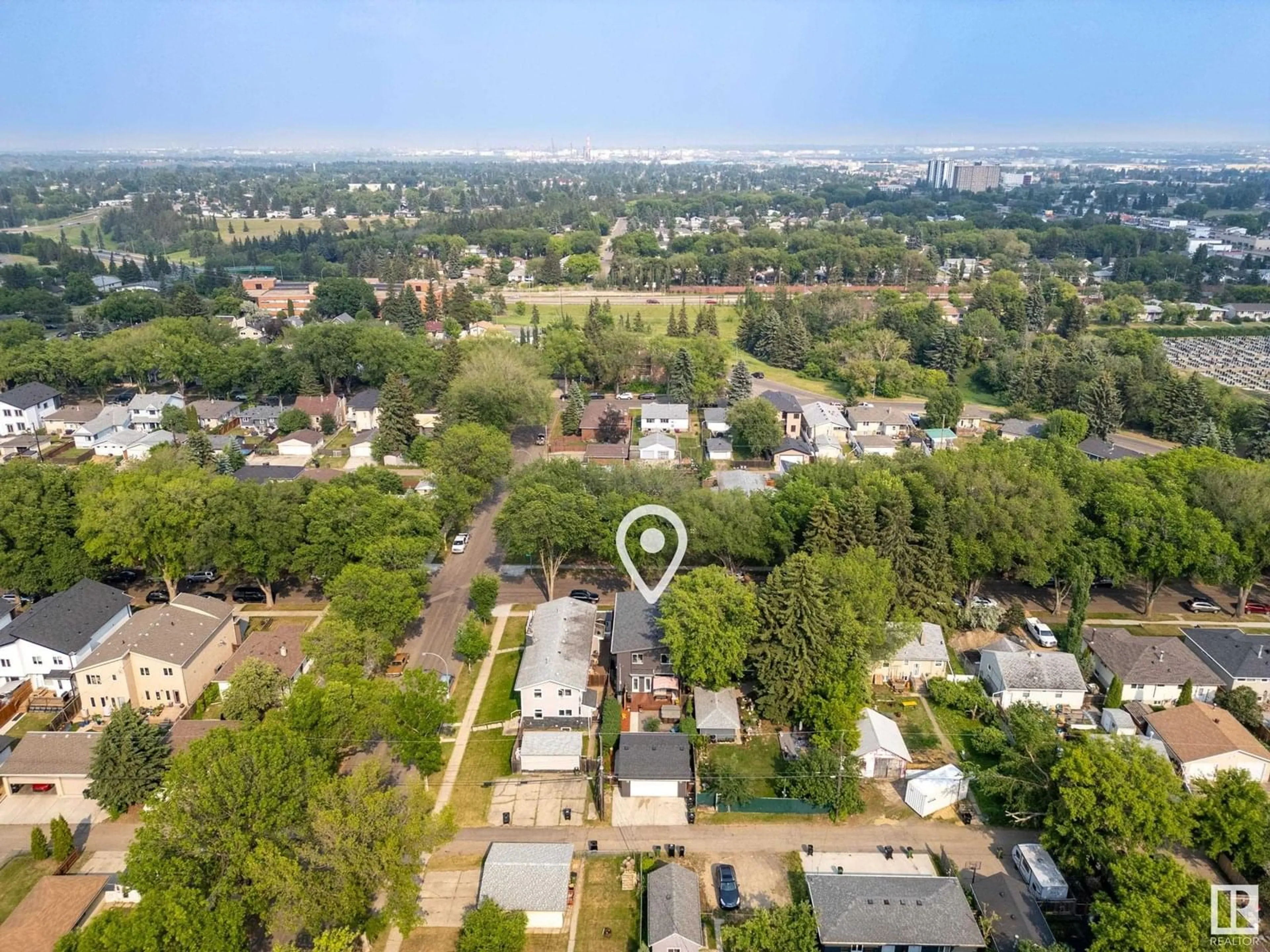 A pic from outside/outdoor area/front of a property/back of a property/a pic from drone, unknown for NW - 10236 78 ST, Edmonton Alberta T6A3E3