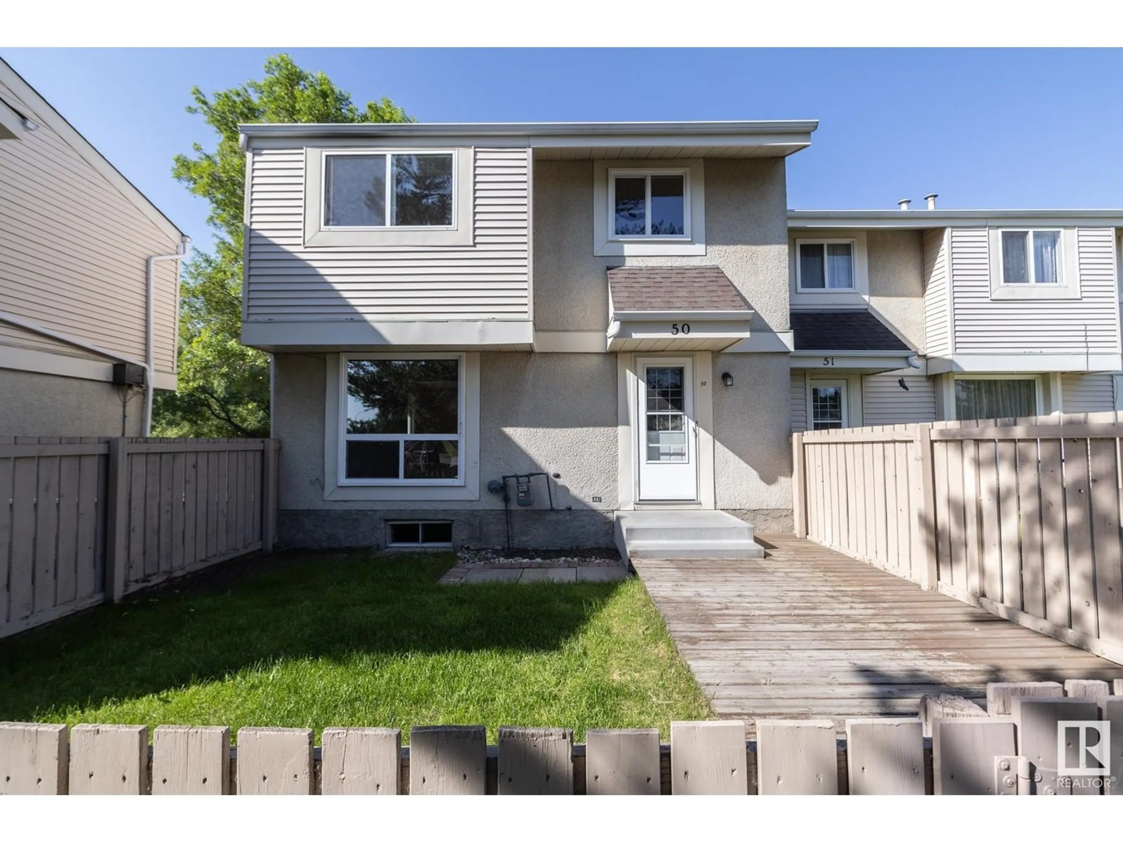 Home with vinyl exterior material, street for 50 ATHABASCA AC, Devon Alberta T9G1L7